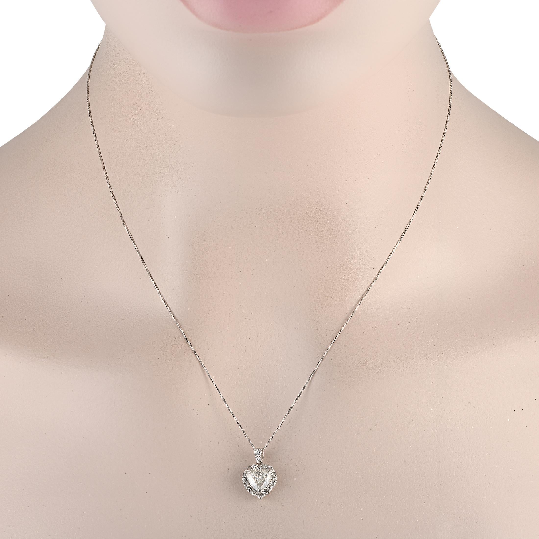 This breathtaking necklace is simply unforgettable. The perfect gift for your beloved, this impeccably crafted accessory comes complete with an opulent 18K White Gold pendant measuring 0.65 long by 0.45 wide suspended from a sleek 18 box chain. A