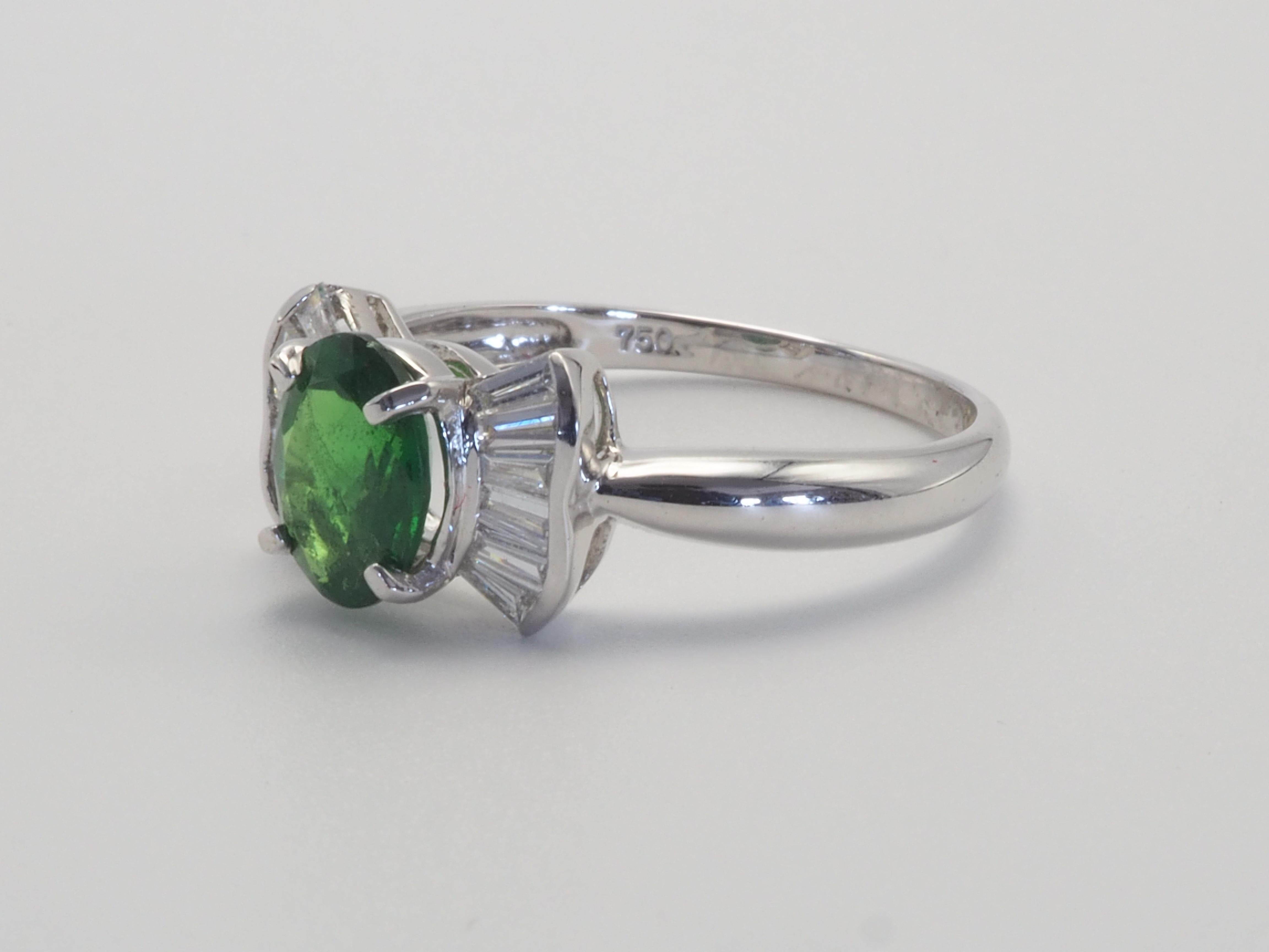 This beautiful bow tie ring is perfect for all woman, especially for those who loves refractive green stones will love the tsavorite. Those who loves green stones may often choose the famous emerald as their first choice, but a few people may also