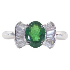 18K White Gold 1.35ct Oval Tsavorite
0.32ct Ribbons Ring 18K White Gold 1.35ct Oval Tsavorite
0.32ct Ribbons Ring