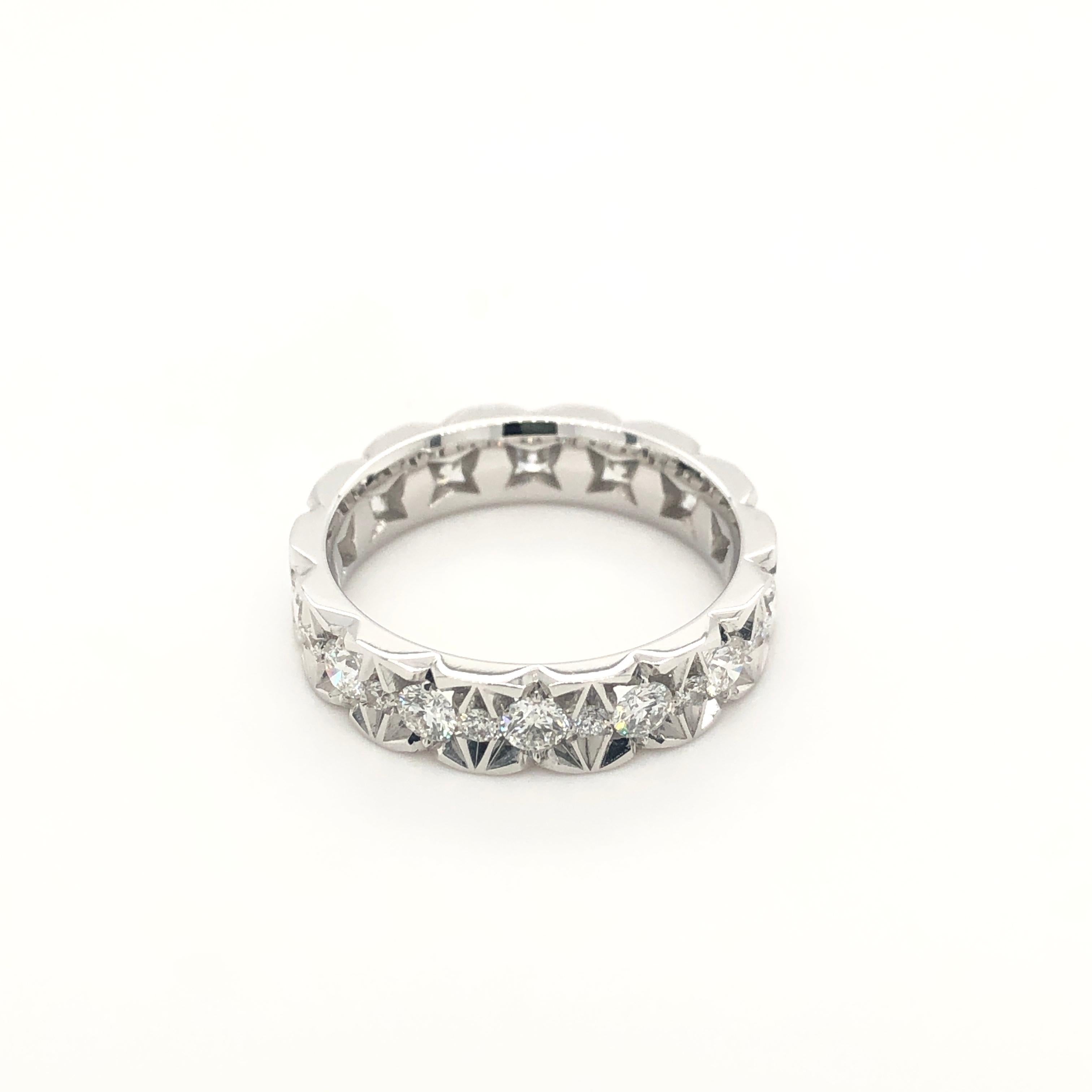 18 Karat White Gold Eternity Ring set with 1.371 Carat White Diamonds.
White Diamonds are brilliant cut.

This ring is available in white gold AND rose gold (see in other listing)
Also beautiful worn together as one.
Or the perfect wedding ring if