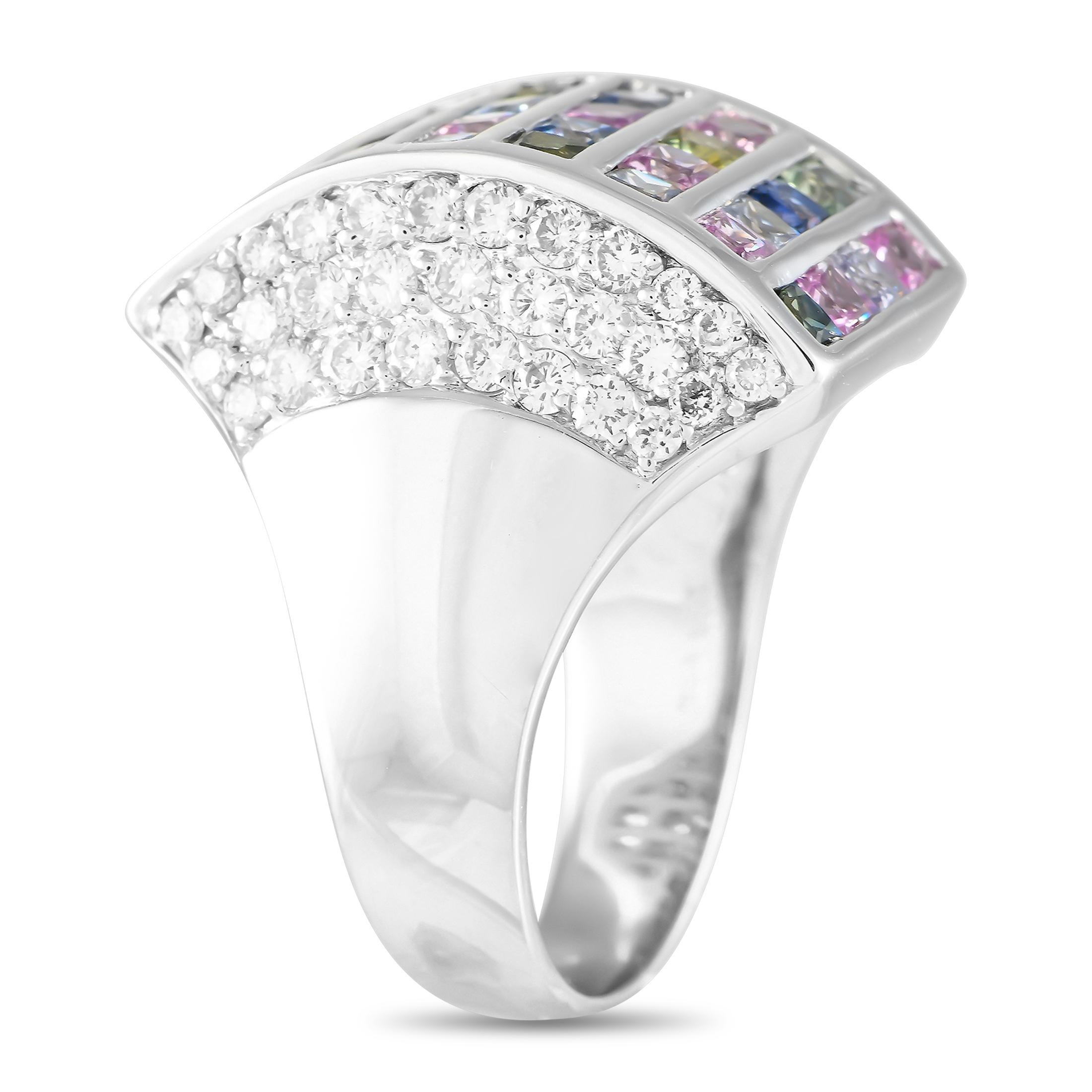 This radiant ring is simply unforgettable. At the top of the 18K White Gold setting, multicolored Sapphire gemstones totaling 2.90 carats ensure it will continually capture your imagination. Diamond accents with a total weight of 1.40 carats provide