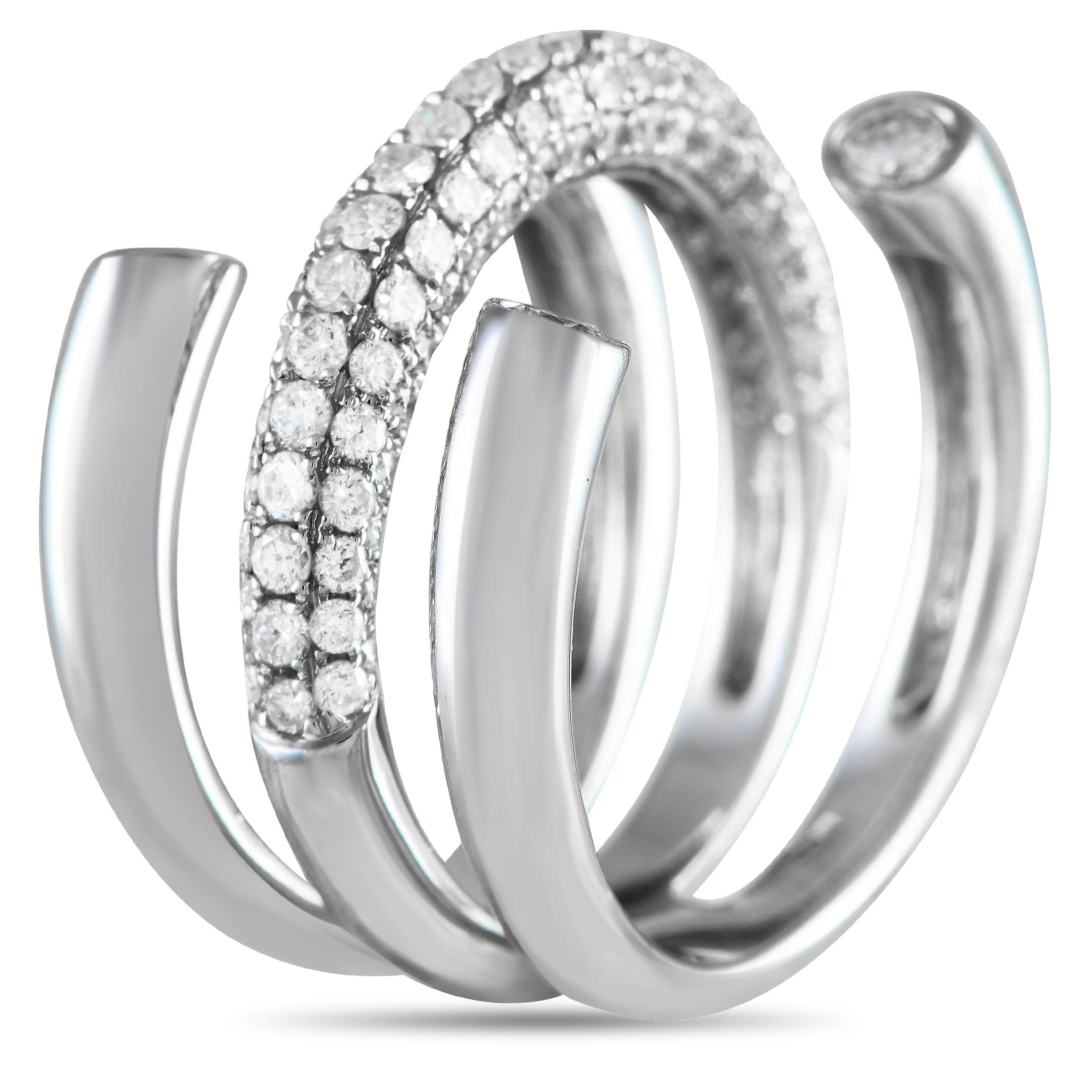This 18K White Gold open ring features a unique design that is instantly captivating. Ideal for everyday wear, the sleek setting comes to life thanks to an array of dazzling Diamonds totaling 1.40 carats. This undeniably breathtaking piece features