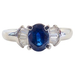 18K White Gold 1.40ct Oval Blue Sapphire & 0.20ct Diamond Bow Ring