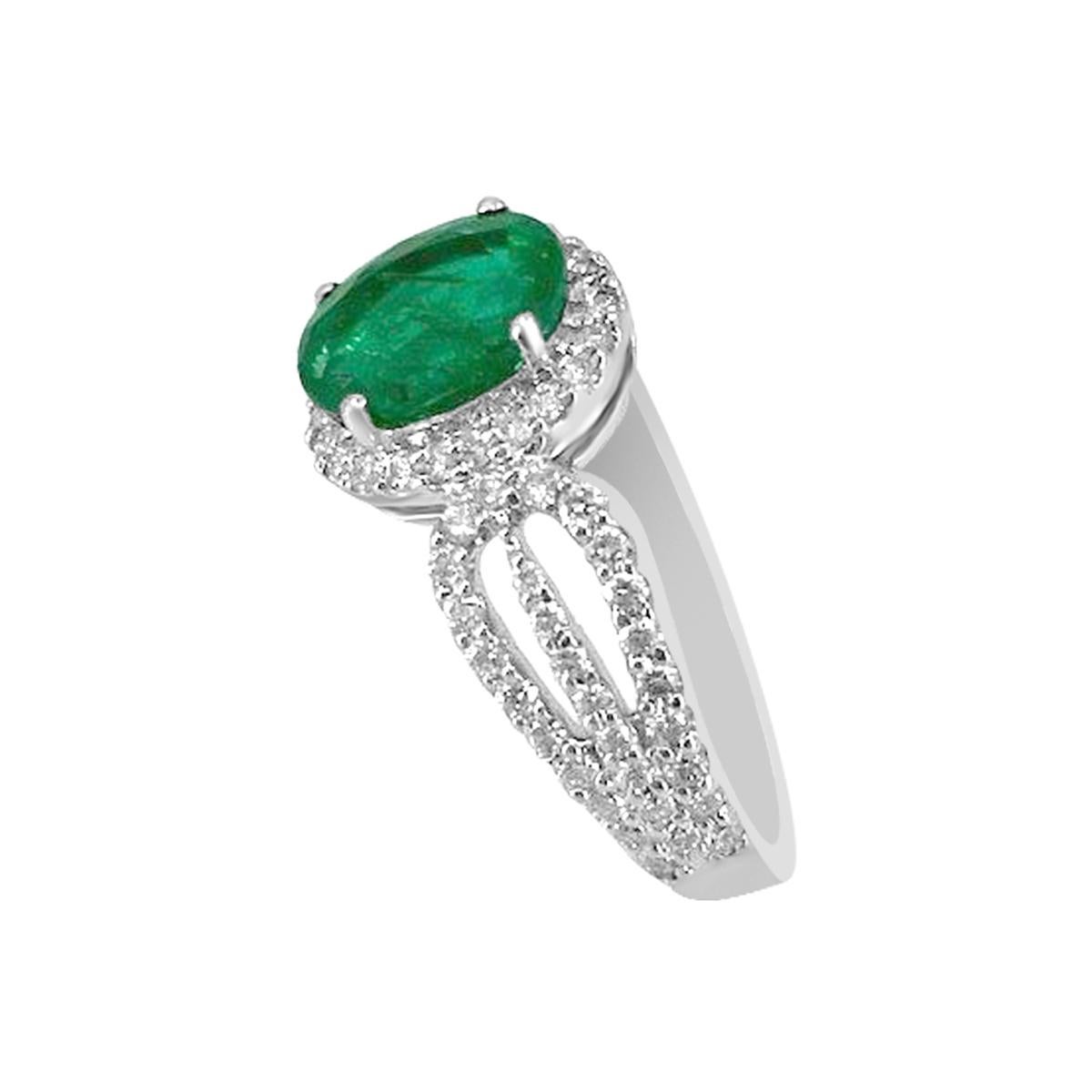 Gracefully Sculpted Beautiful Emerald Vintage Ring Features 8x6mm Oval Cut Emerald Gemstone Setting And Finished In The Diamond Scalloped Band To Complete Its Distinctive And Elegant Look. Adore Your Future Bride With This Vintage Inspired Elegant