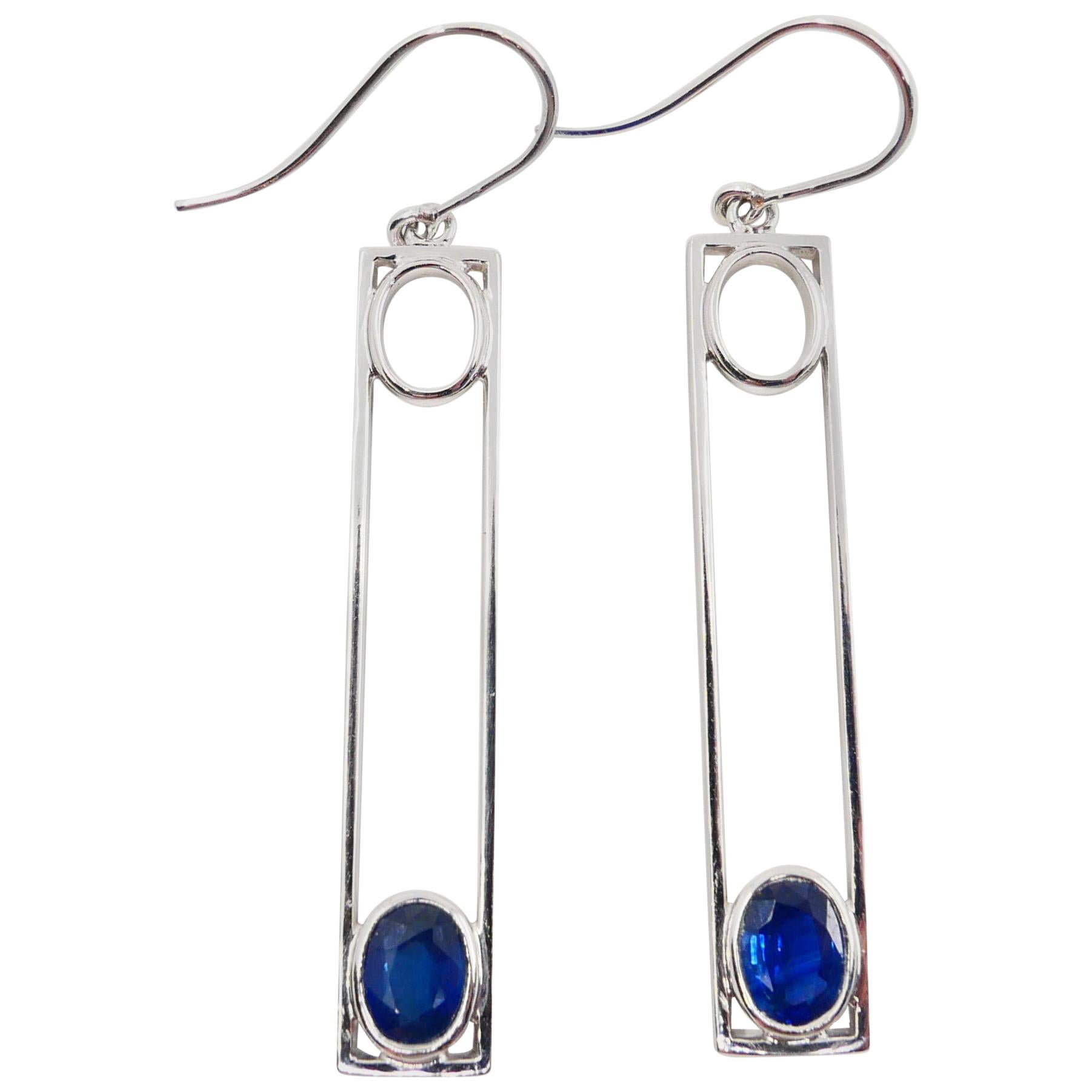 Oval Cut 18 Karat White Gold 1.44 Carat Blue Sapphire Drop Earrings For Sale
