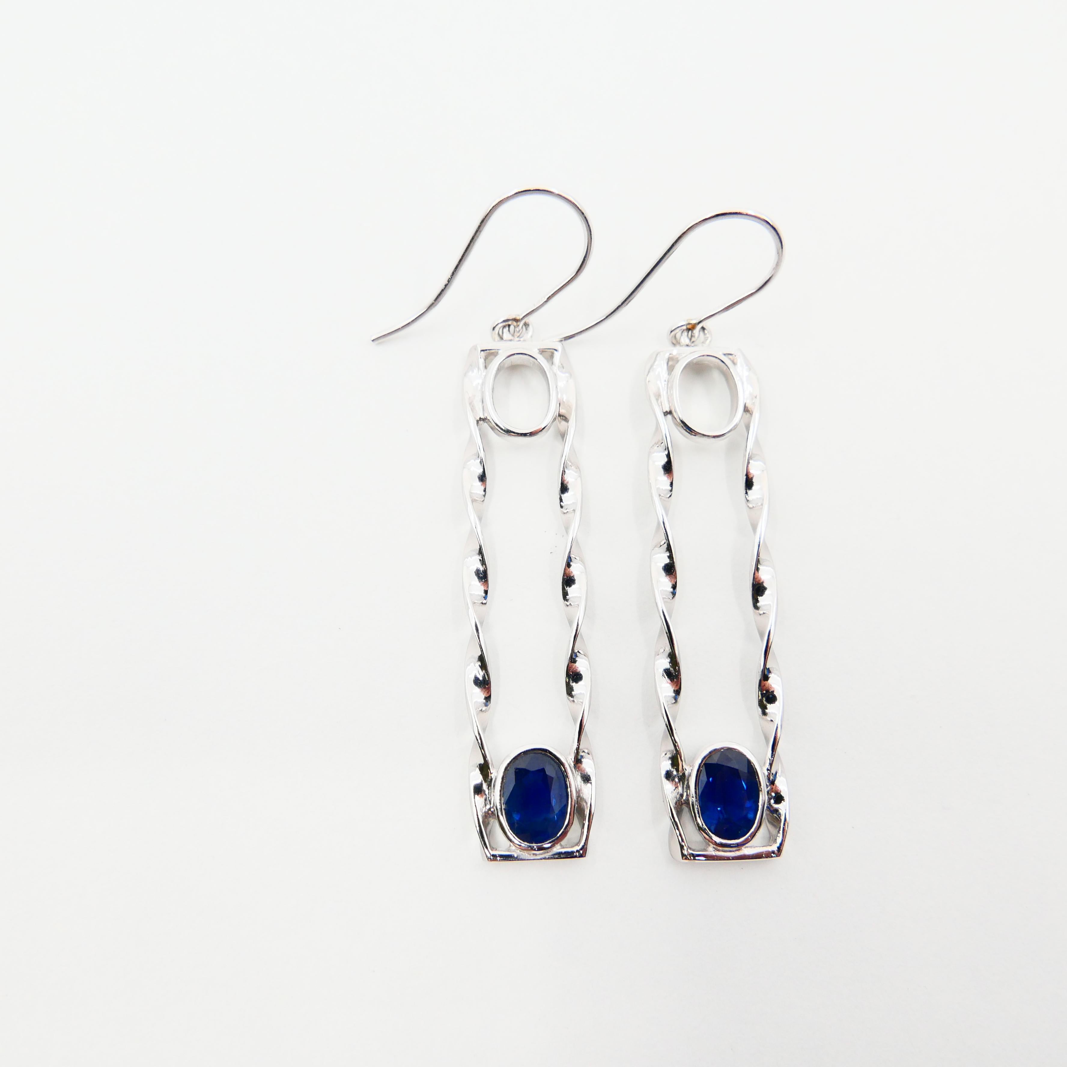 18 Karat White Gold 1.45 Carat Blue Sapphire Drop Twist Earrings For Sale 1