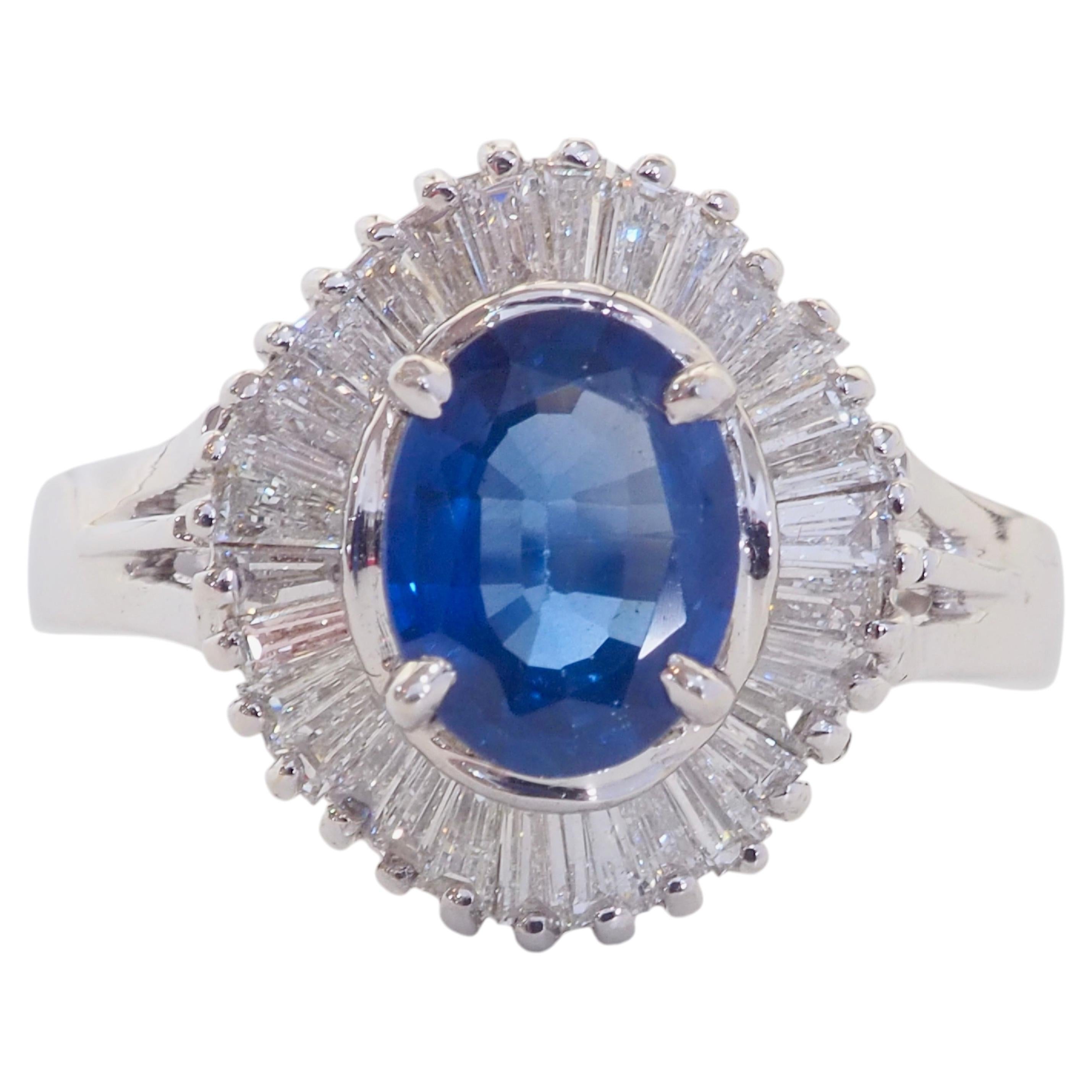 18K White Gold 1.48ct Oval Electric Blue Sapphire & 0.88ct Diamond Ring For Sale