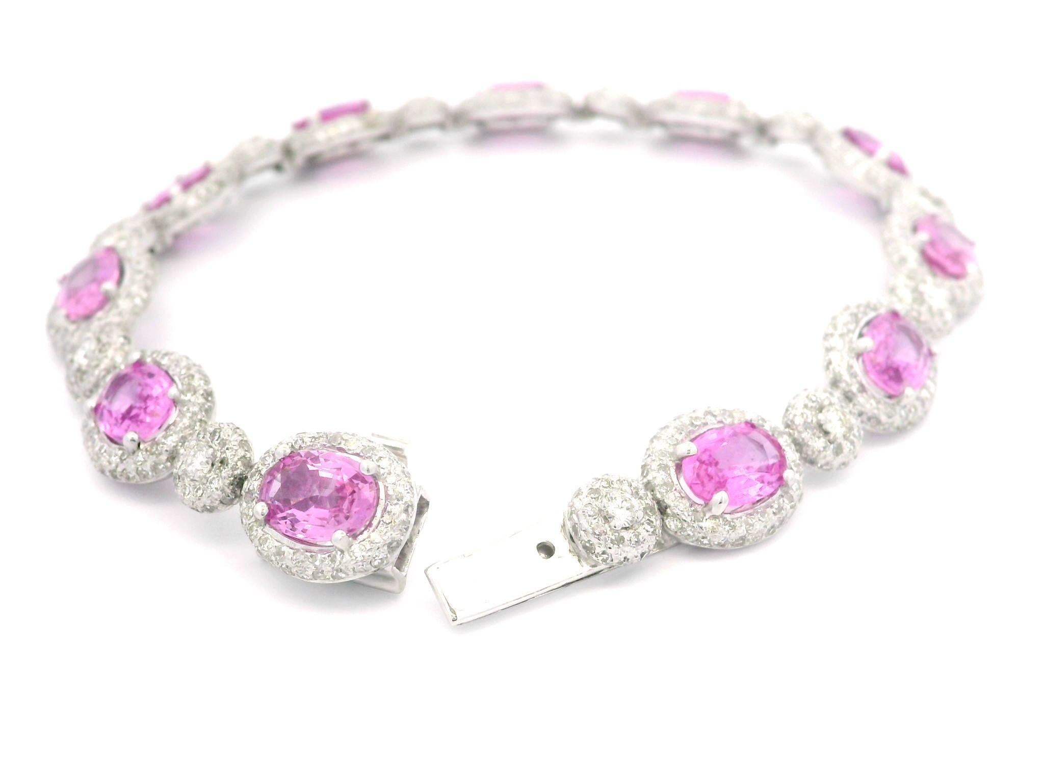 --Stone(s):--
11 Natural Genuine Sapphires - Oval Cut - Prong Set - Pink Color - HEATED - 10ctw(approx. based on GIA measurements
**See Details Below For More Info**
825 Natural Genuine Diamonds - Single Cut & Round Brilliant Cut - Pave Set - Nice
