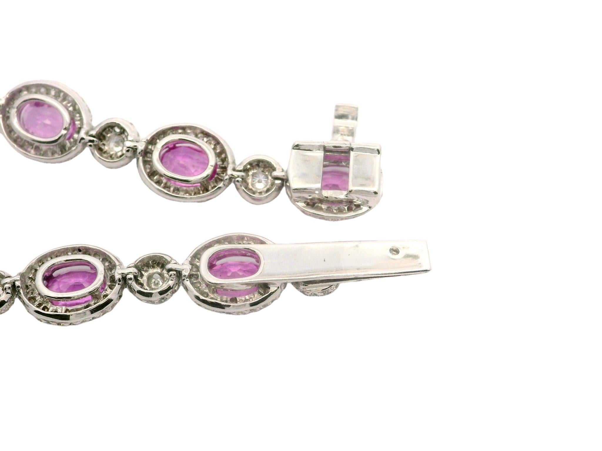 Oval Cut 18k White Gold 14ctw GIA Oval Vivid Oval Pink Sapphire & Diamond Line Bracelet For Sale