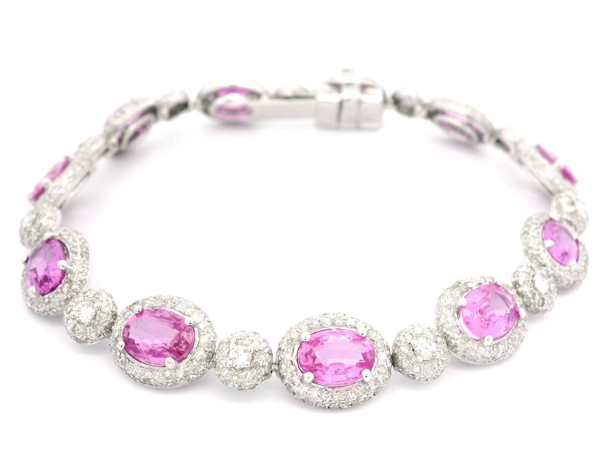 Women's 18k White Gold 14ctw GIA Oval Vivid Oval Pink Sapphire & Diamond Line Bracelet For Sale