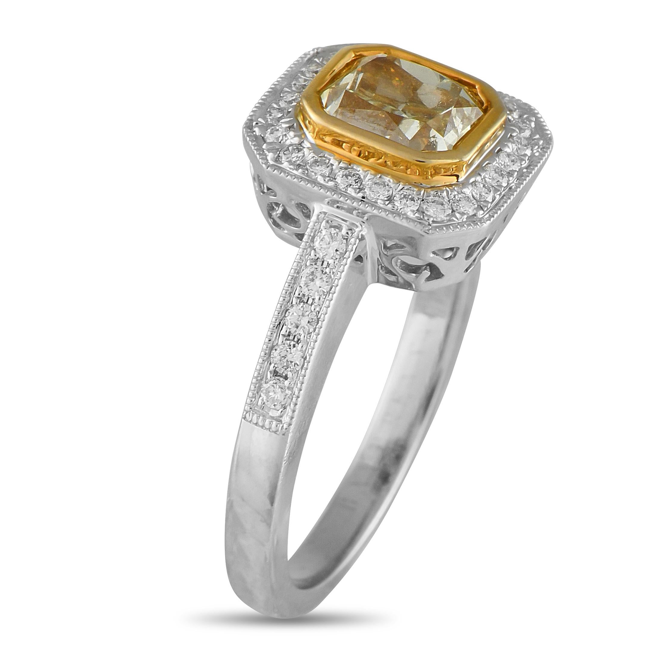 This radiant ring features a vintage inspired design that will never go out of style. A 1.50 carat Fancy Yellow Diamond with SI1 clarity makes a statement at the center, while additional Diamond accents totaling 0.25 carats elevate the 18K White