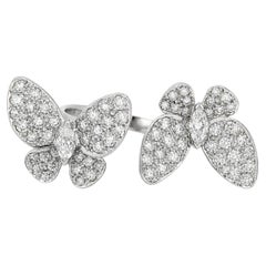 Anello a doppia farfalla in oro bianco 18 carati con diamanti taglio marquise e rotondo per un totale di 1,50 carati