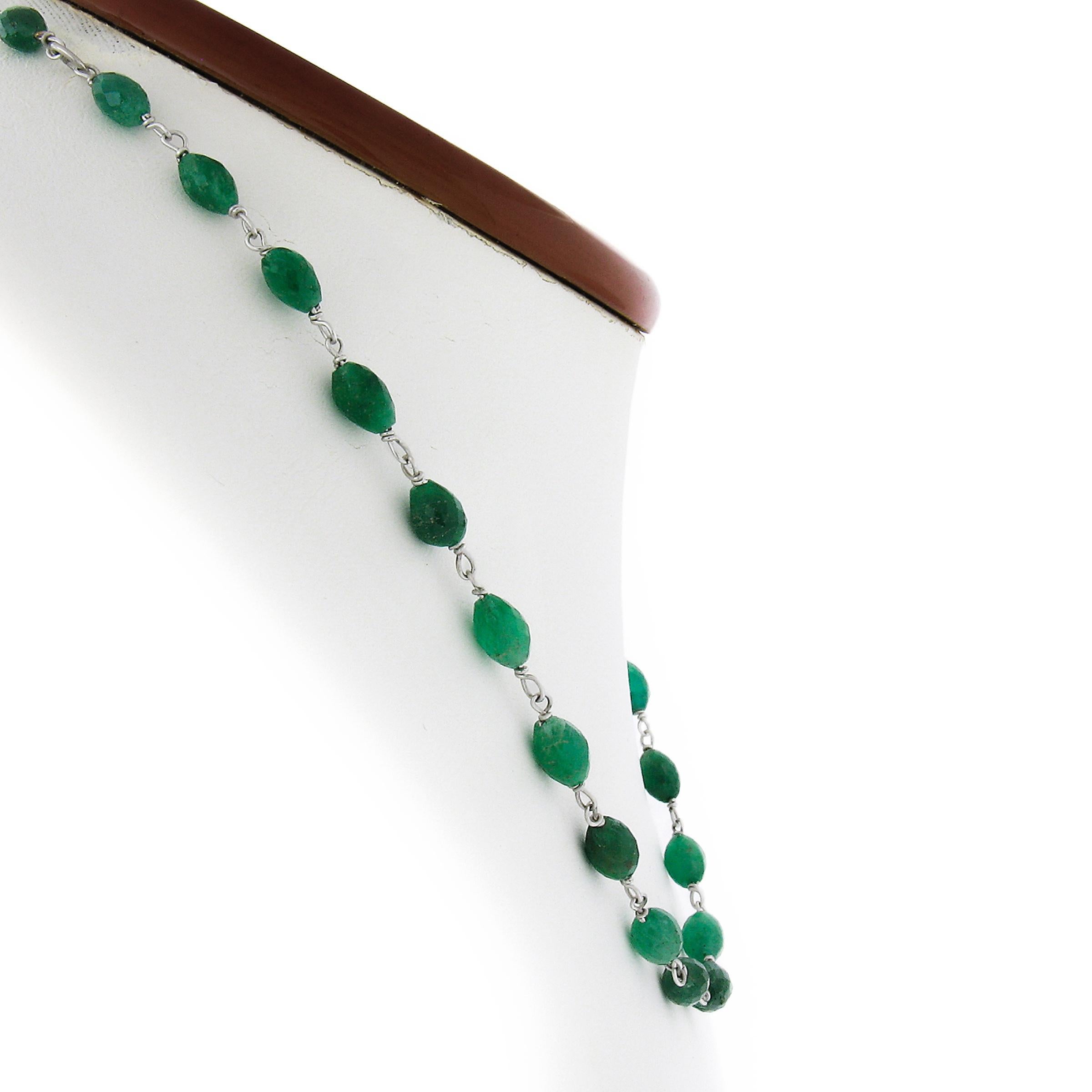 --Stone(s):--
(28) Natural Genuine Emeralds - Faceted Barrel Bead Shape - Strung -Green Color ** See Certification Details Below for Additional Info **

Material: Solid 18K White Gold Clasp w/ 14K White Gold Wire
Total Weight: 9.5 Grams
Length: 15.5