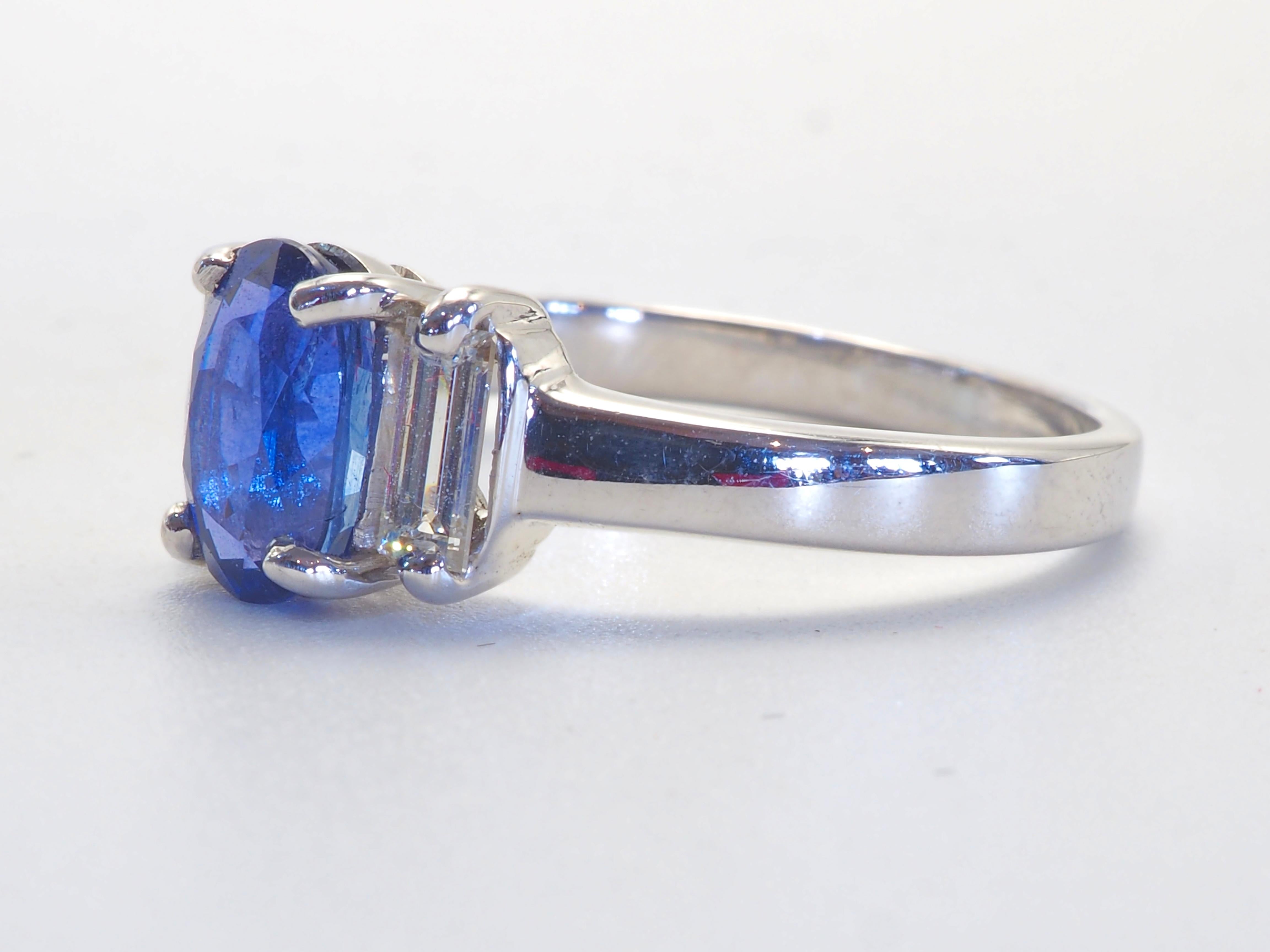 A finely crafted sapphire and diamond engagement ring. Beautiful oval cornflower blue sapphire of 1.60 carats set in the middle nicely. The blue gemstone has great brilliance and fire with very slight inclusion, very clear upon inspection by eye.