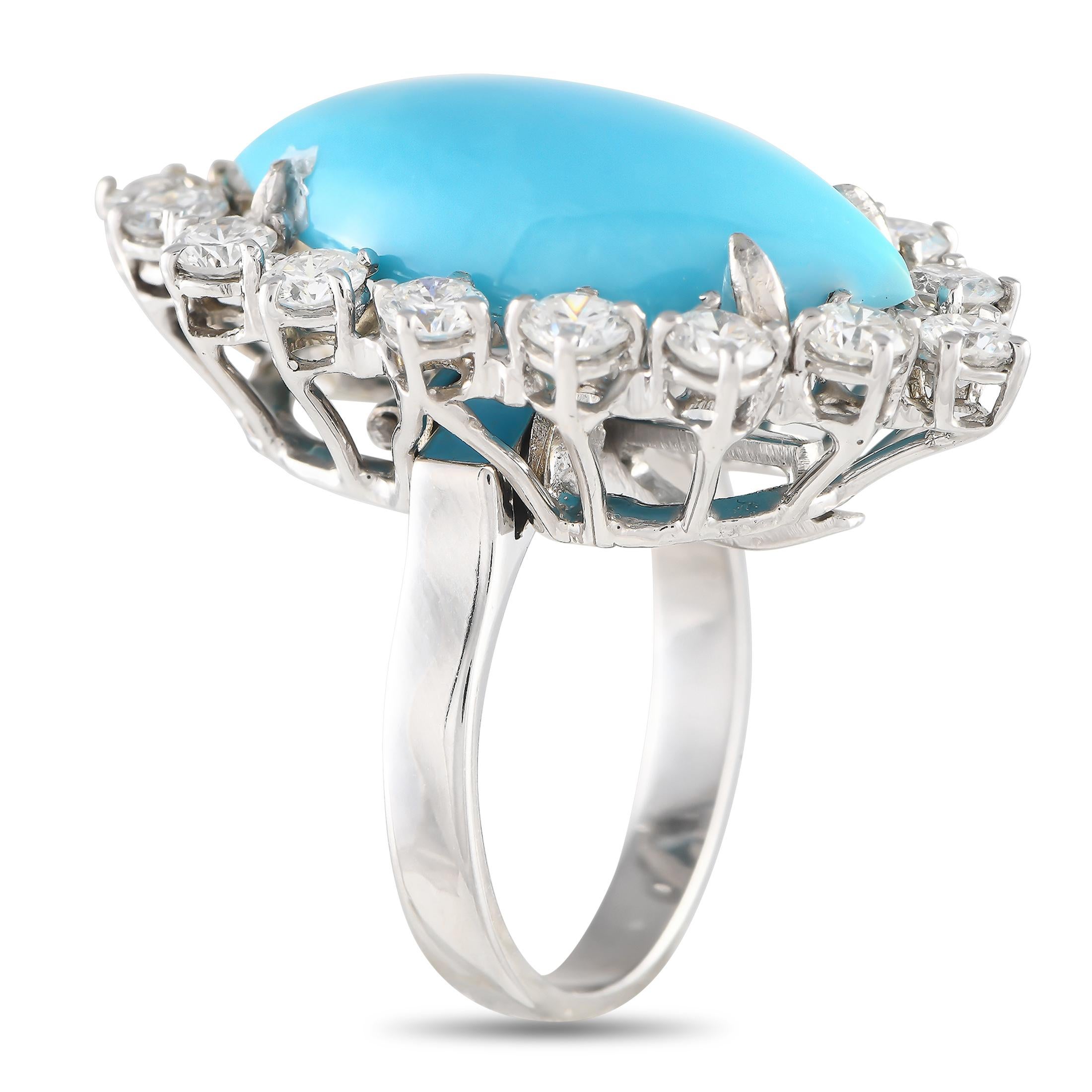 Theres more to this luxurious piece than initially meets the eye. A bold Turquoise cabochon is surrounded by a halo of diamonds totaling 1.60 carats on this radiant ring, which features a 2mm wide band and a 10mm top height. Slip of the center