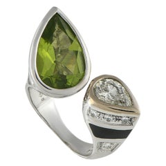 Anello con diamante e peridoto in oro bianco 18 carati da 1,63 carati
