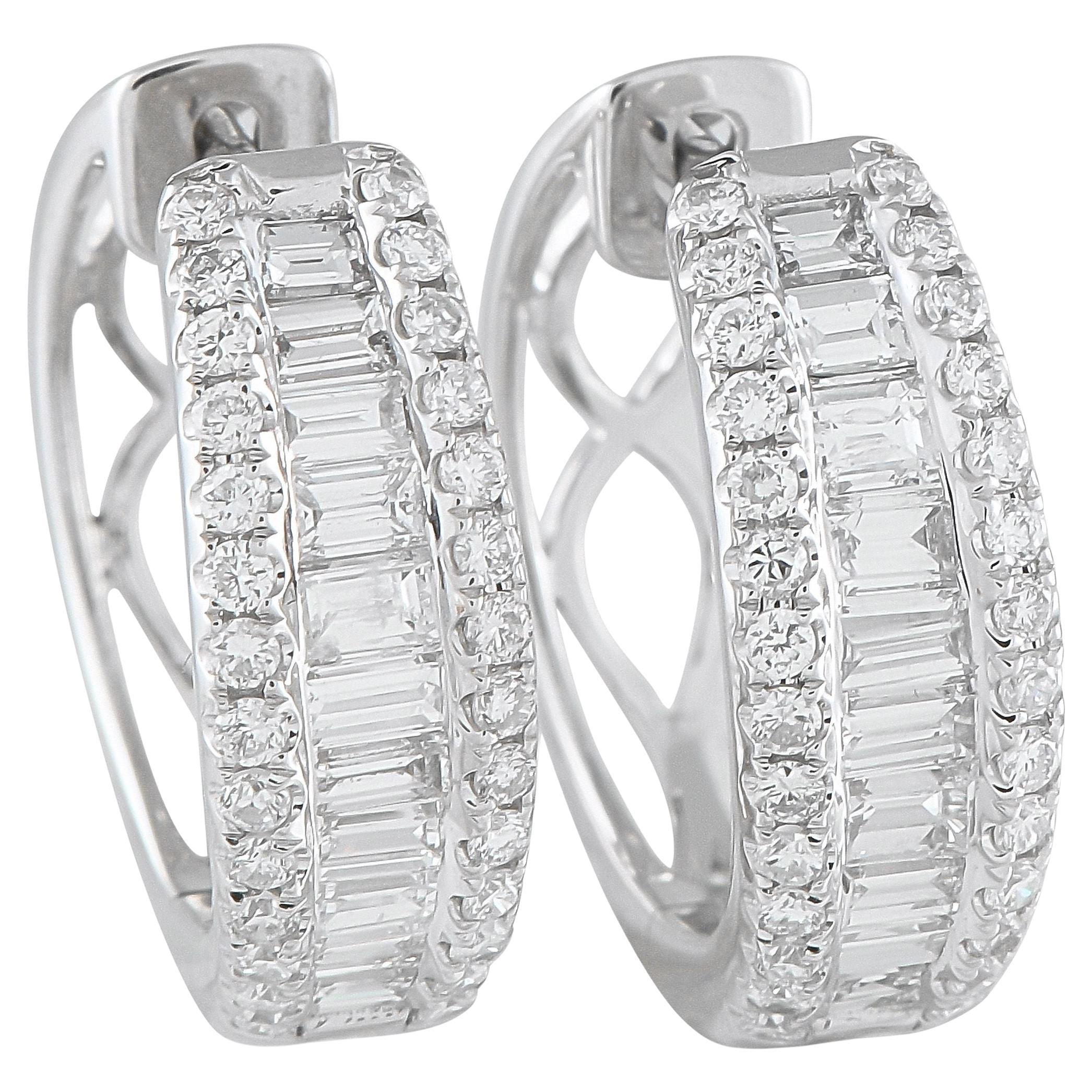 Boucles d
oreilles en or blanc 18K avec 1,65ct de diamant