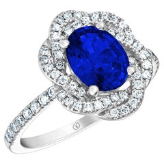Bague en or blanc 18 carats avec saphir bleu de 1,69 carat et diamants de 0,37 carat