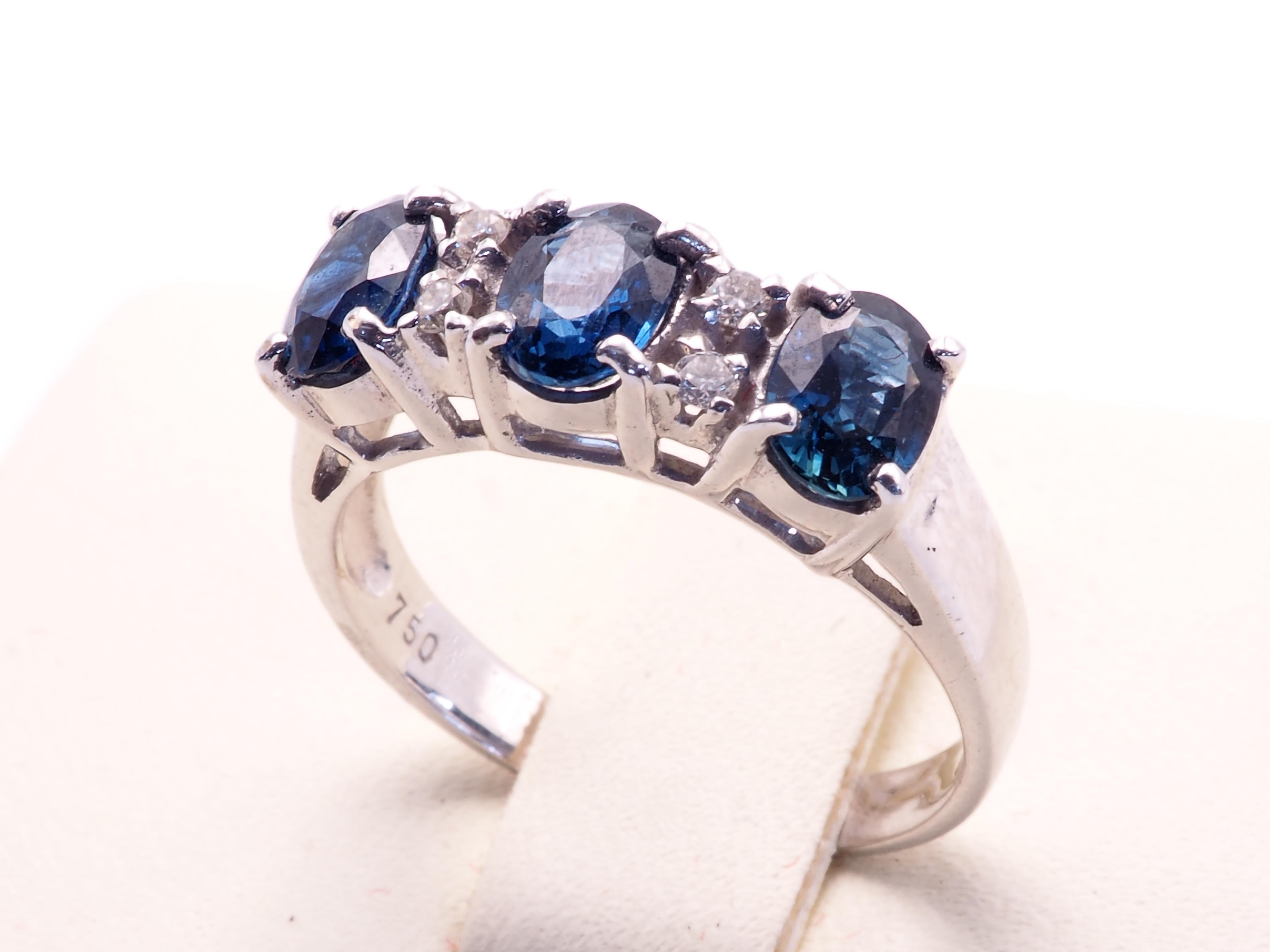 Women's 18K White Gold 1.70ct Blue Sapphire & 0.07ct Diamond Three Stone Ring For Sale