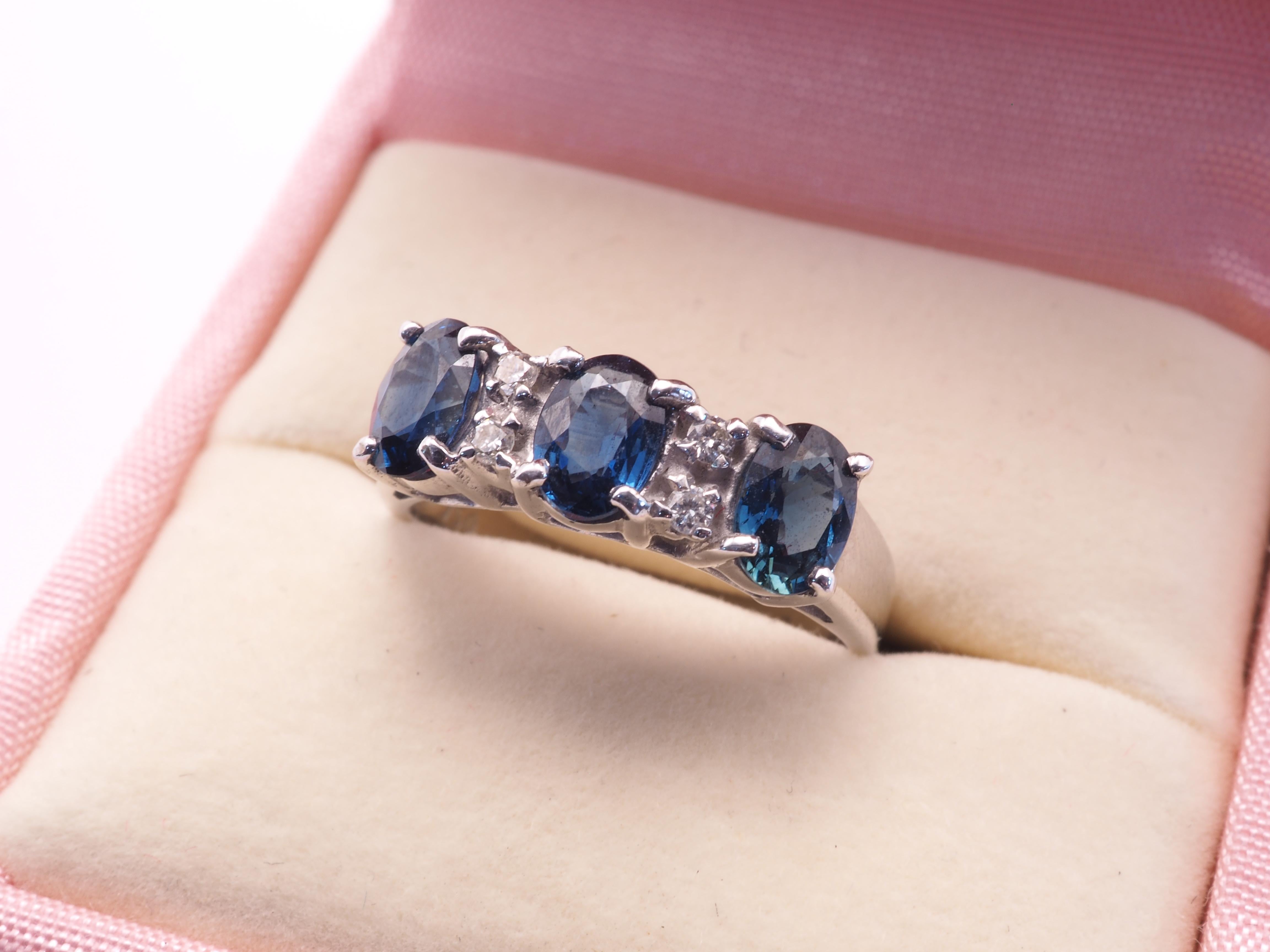 18K White Gold 1.70ct Blue Sapphire & 0.07ct Diamond Three Stone Ring For Sale 3