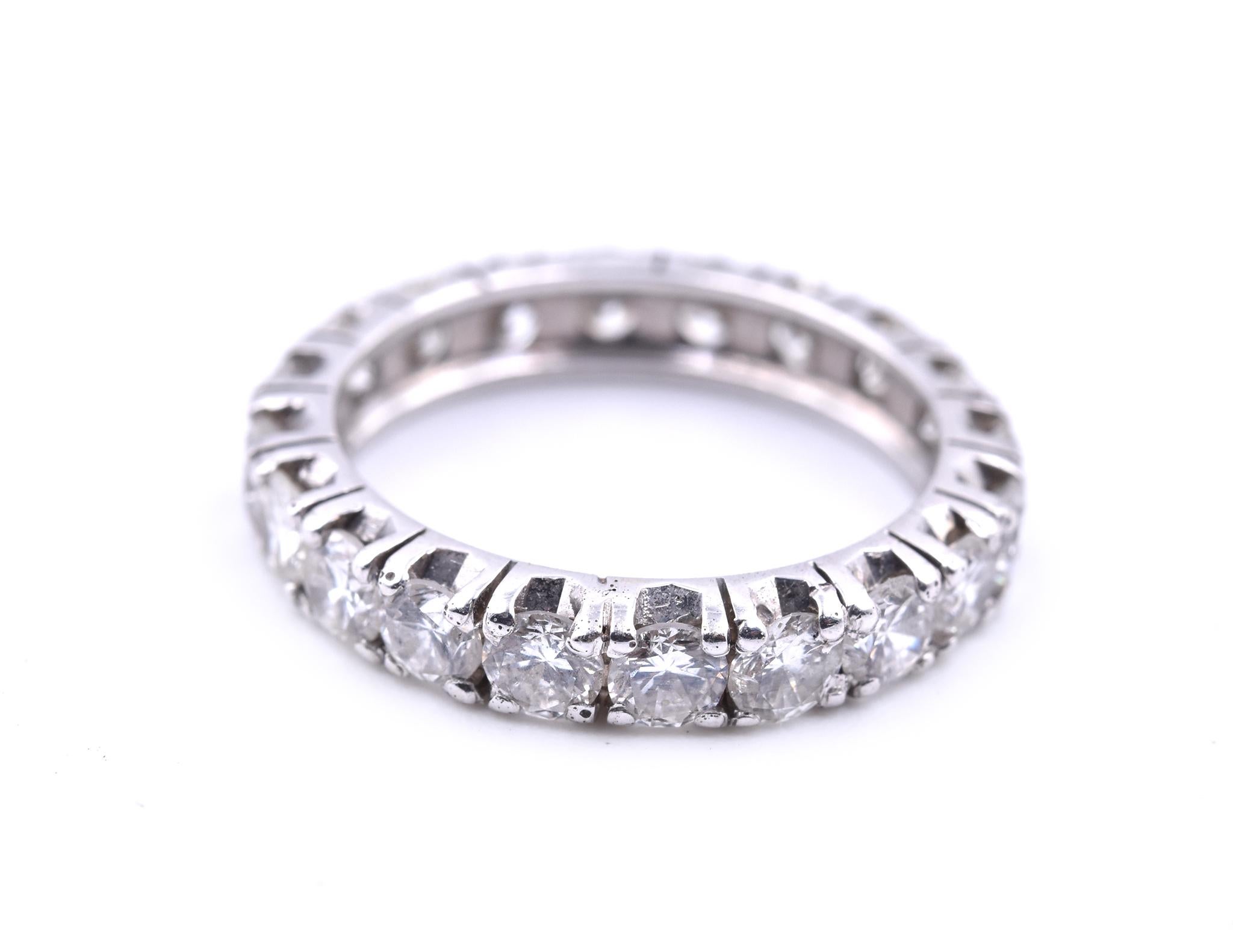 Designer: custom design
Material: 18k white gold
Diamonds: 20 round brilliant cut= 1.80cttw
Color: H
Clarity: SI1
Size: 4 ½ 
Dimensions: ring is 3.29mm wide
Weight: 2.19 grams
