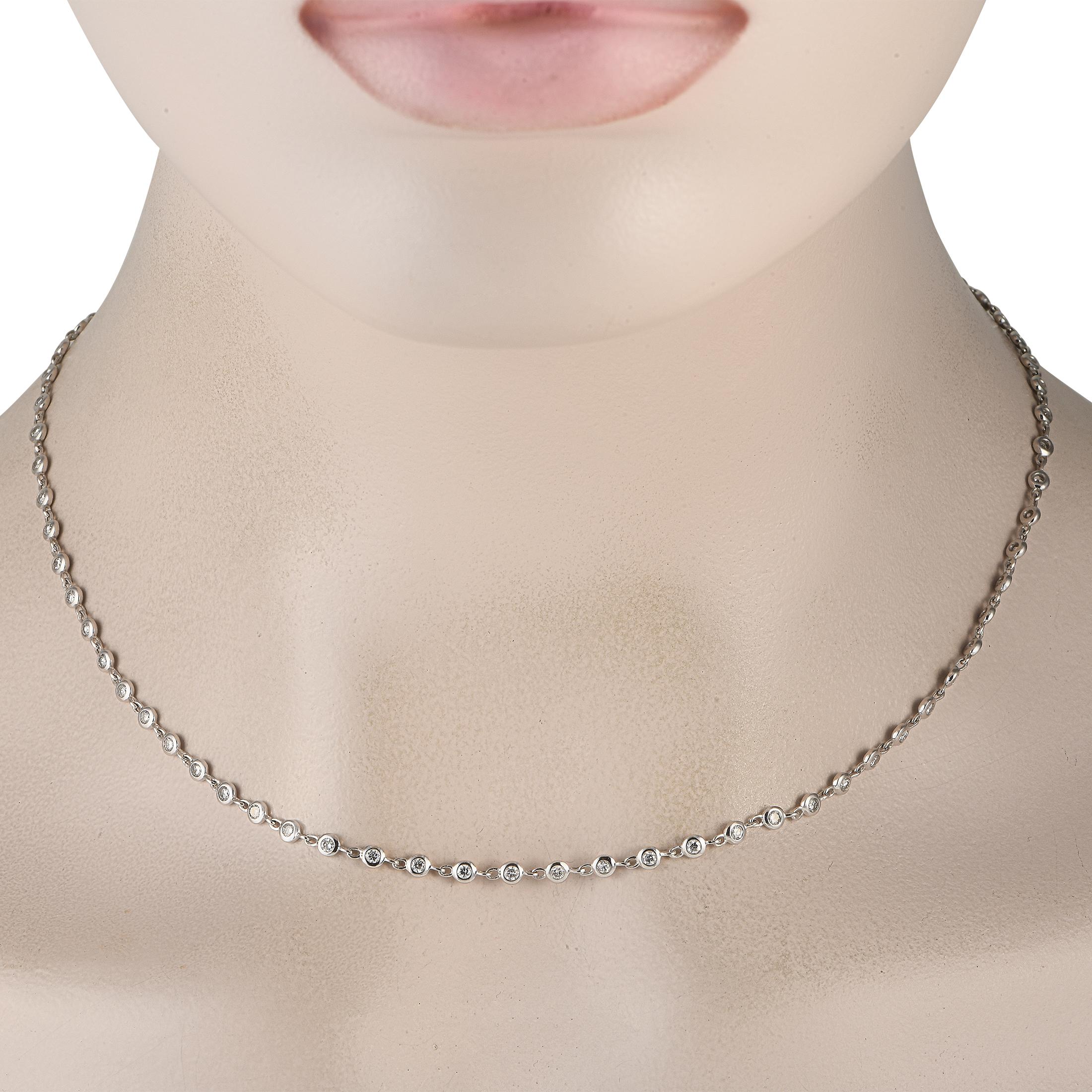 For everyday wear and special occasions, this diamond necklace will effortlessly add a touch of elegance to your outfits. This white gold piece features a string of bezel-set round diamonds totaling 1.90 carats. The necklace's straightforward design