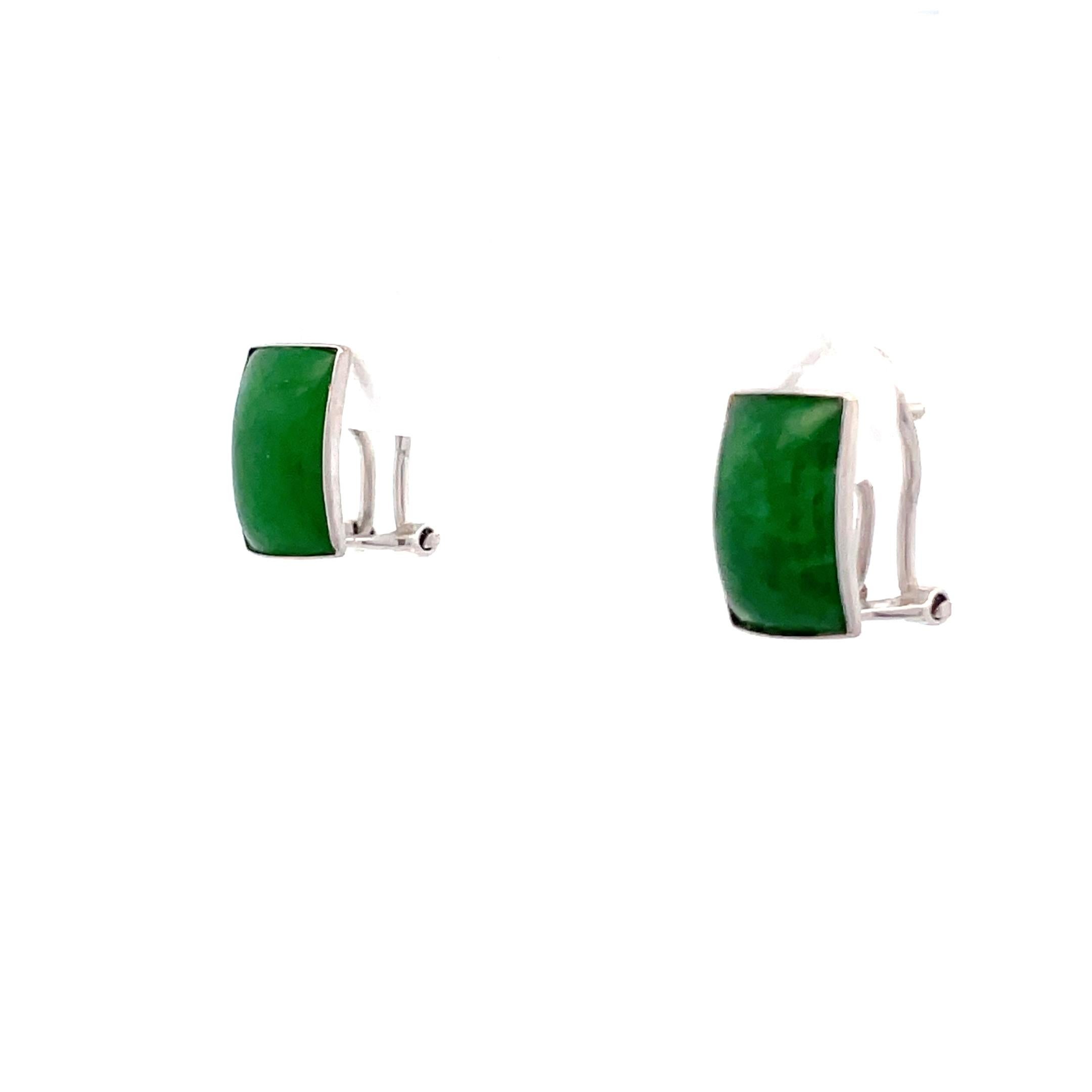 - 18K white gold 
- Bezel set 10.8mmx7.8mm Jade 
- Lever-back design 
- 3.33 grams 
- 1960s 

This is a beautiful pair of bezel set jade lever-back earrings, made in 18k white gold, from the 1960s. The large jade in each ear is magnificent, they