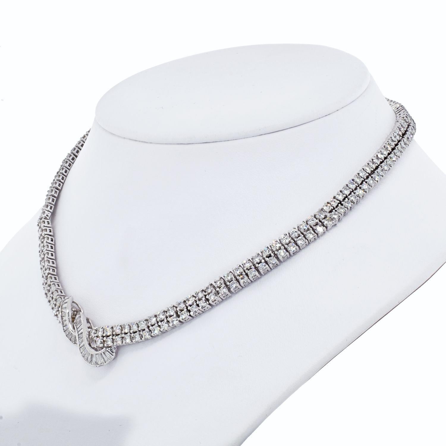 18K White Gold 20 Carat Round Cut Diamond Estate Tennis Riviera mounted with over 200 round diamonds and over 40 tappered baguettes. 

Diamond quality: G-H color, SI1-SI2 clarity. 

The necklace is comprised of two rows of round cut diamonds mounted