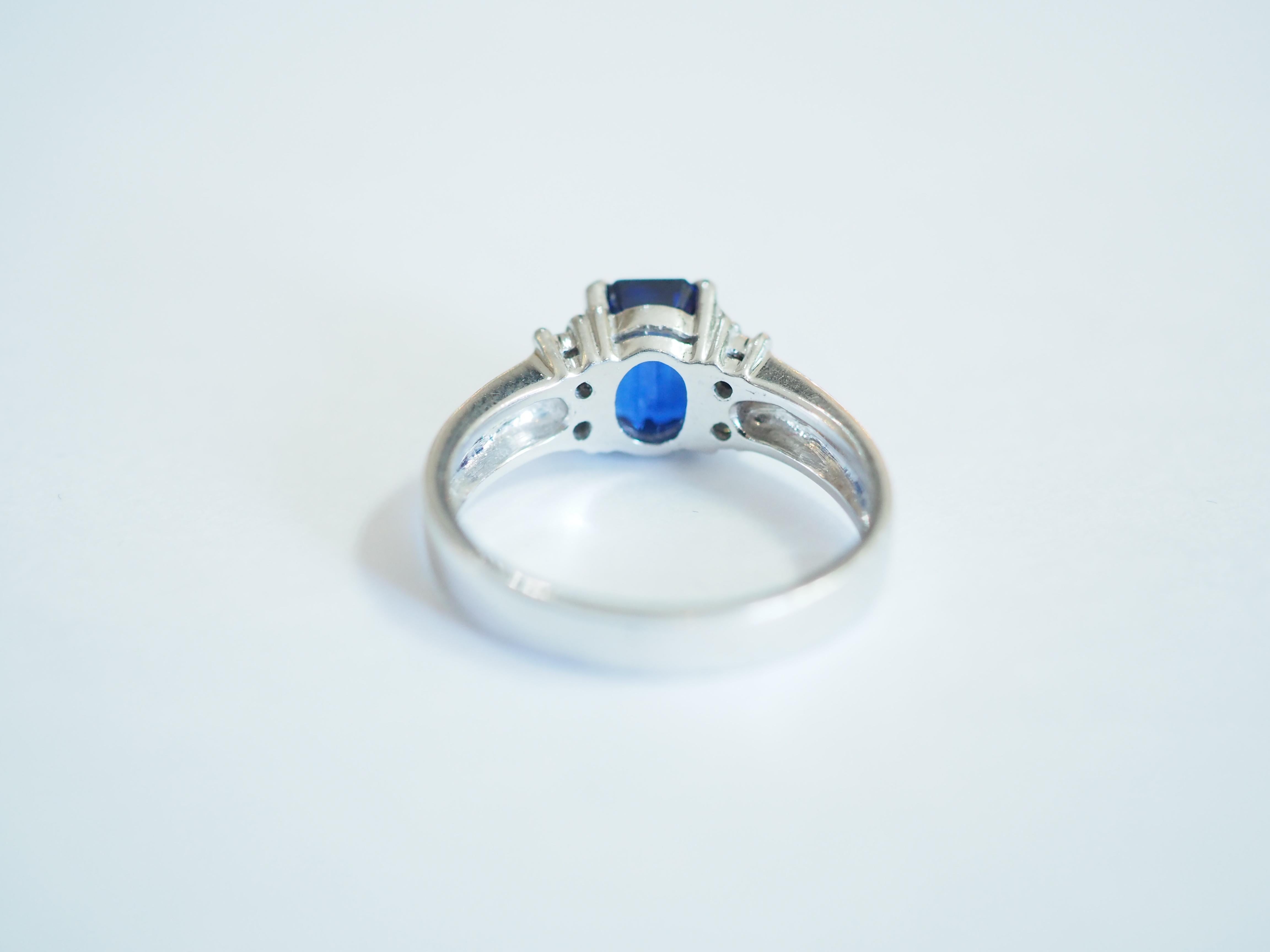 Women's or Men's 18k White Gold 2.03ct Emerald Cut Royal Blue Sapphire & Diamond Engagement Ring For Sale