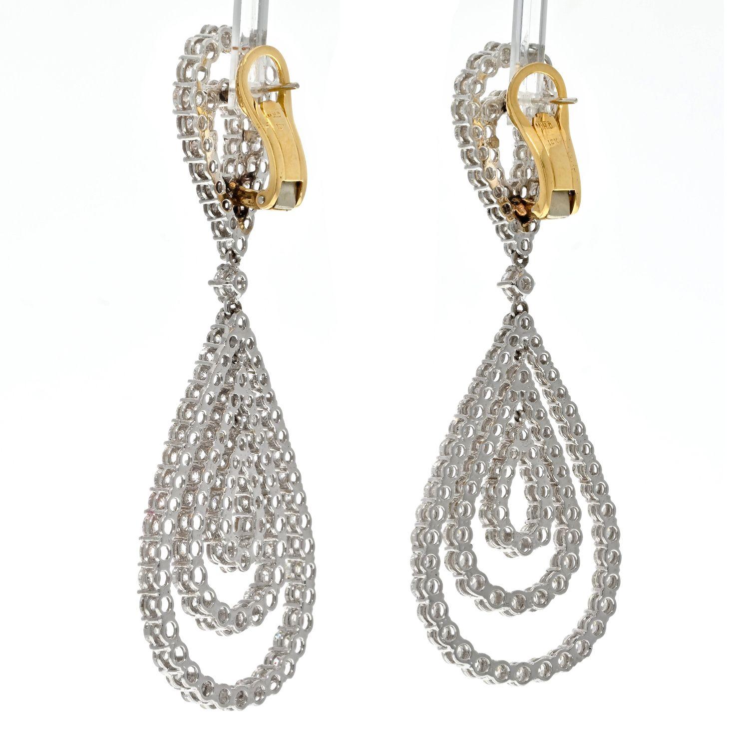 Estate diamond drop earrings made in 18K white gold mounted with round cut diamonds of approx. 21.00cttw. 
These beautiful openwork diamond earrings are all sparkle, diamond quality is exactly what you want your beautiful jewelry to have, clean