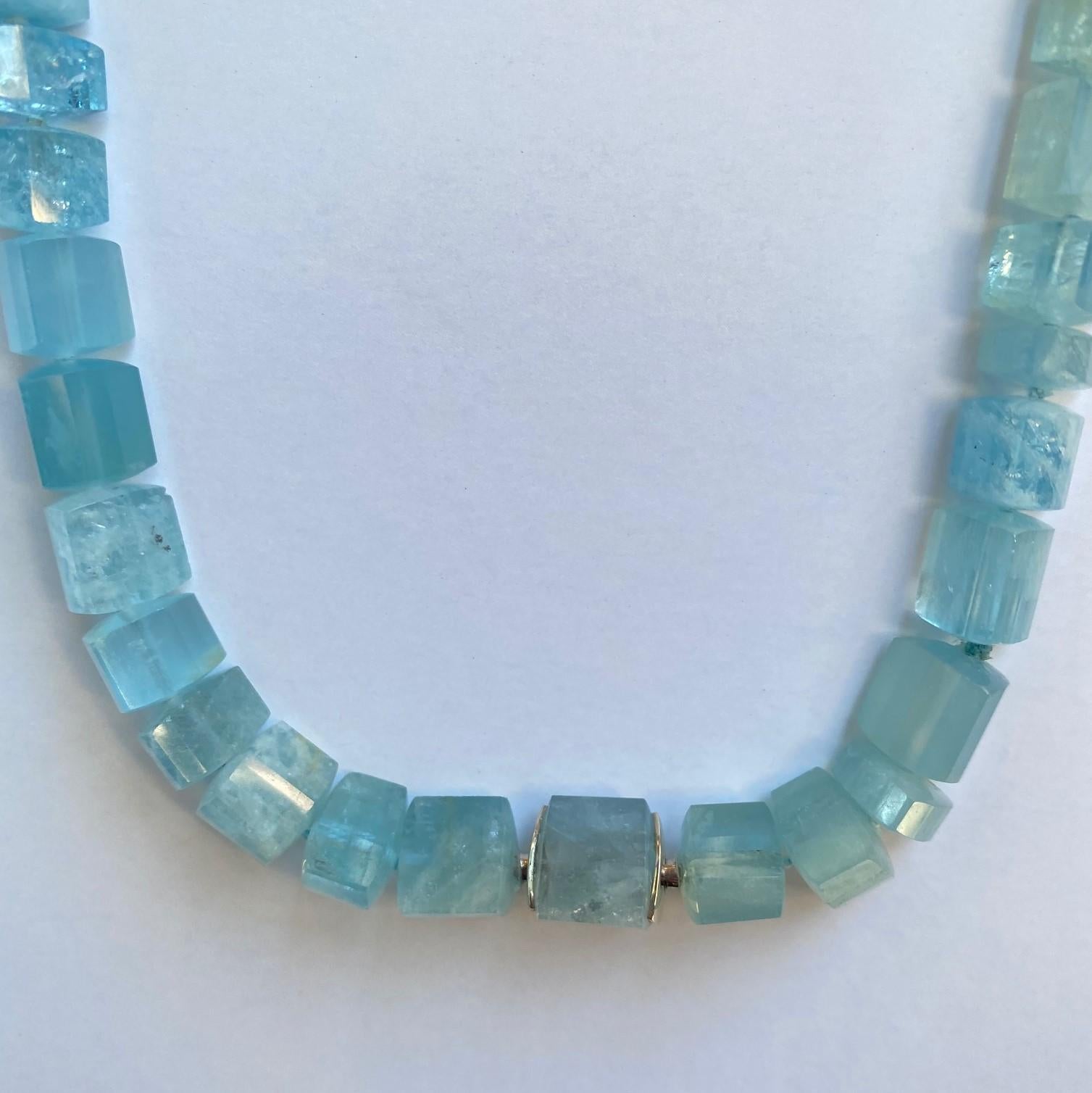 A Brazilian trillion shaped aquamarine necklace (215tcw) and a self-clasp with 18k white gold parts. Designed and made by llyn strong.