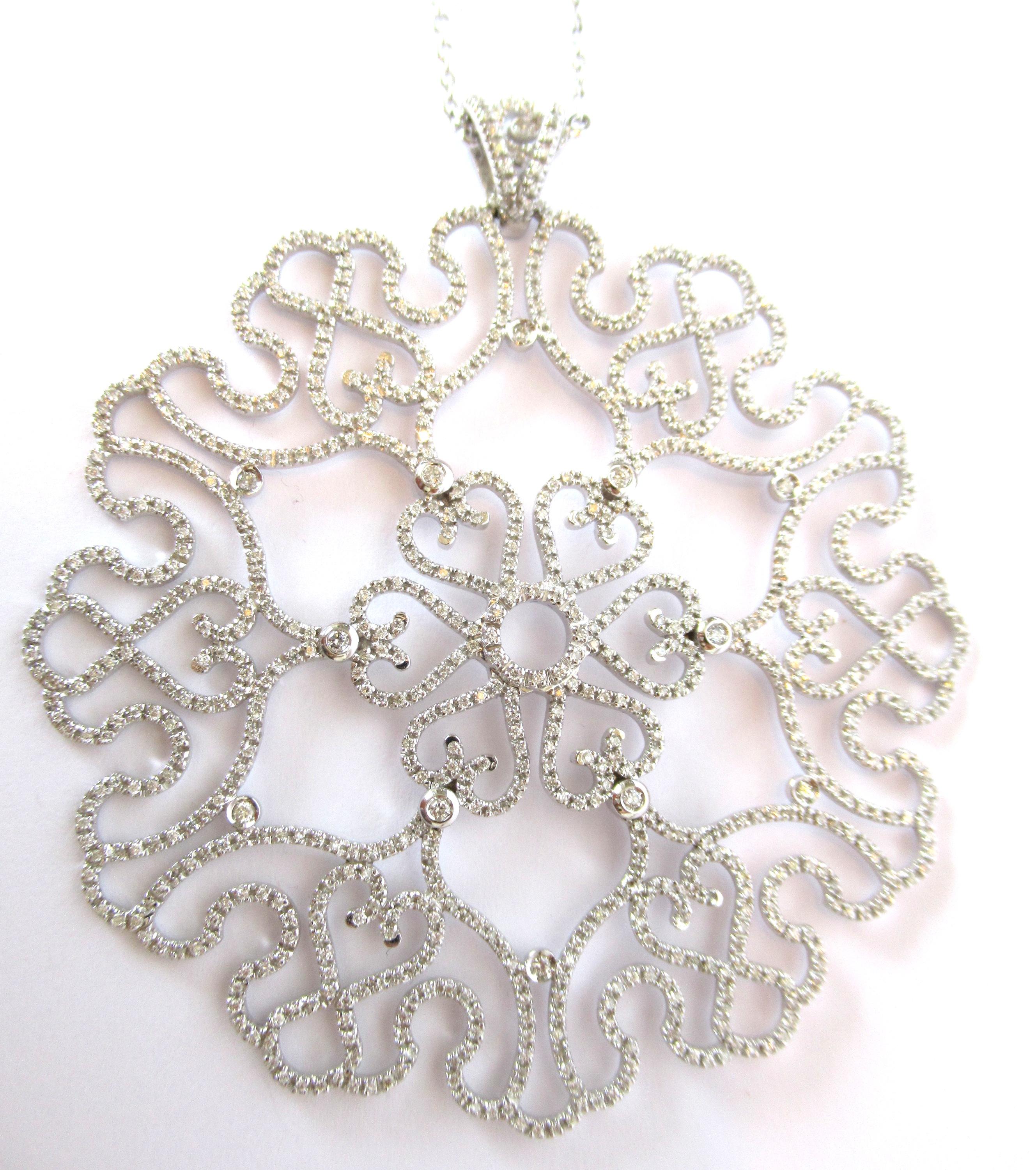 This necklace is inspired by snowflakes. Snowflake symbolizes spotless beauty, pure and noble. A white diamond pendant realized in 18K white gold with white diamonds.
18 K White Gold  23.60 Grams
White Diamonds Brilliant Cut 2.16 Carats
All Our