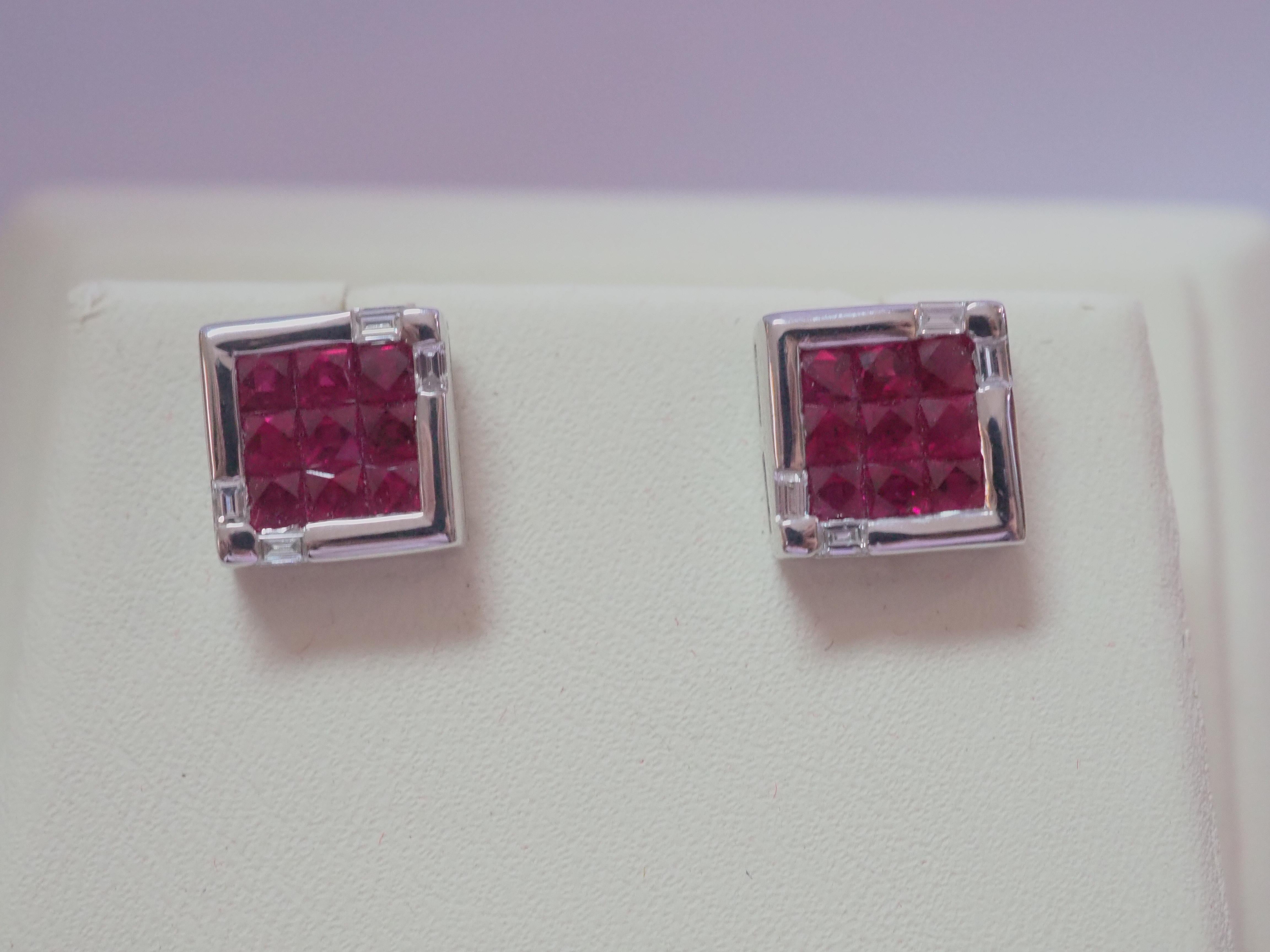 Beautiful and unique earrings made in the 1990's and has never been worn. The earrings have the unique geometric shape/ symbol with cutting-edge design. Very cool and fashionable.

There are 18 squared red rubies in total and therefore 9 for each