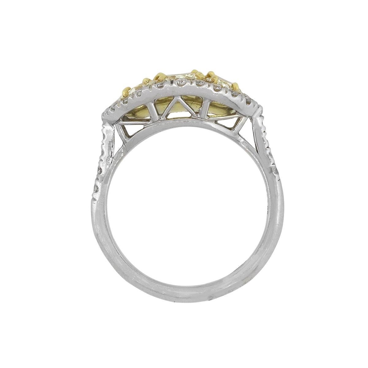 Cushion Cut 18 Karat White Gold 2.33 Carat Diamond Three-Stone Halo Ring