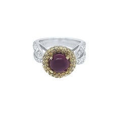 18k Gold 2.35 Carat Cabochon Ruby with 1.55 Carat Diamonds on a Split Shank Ring