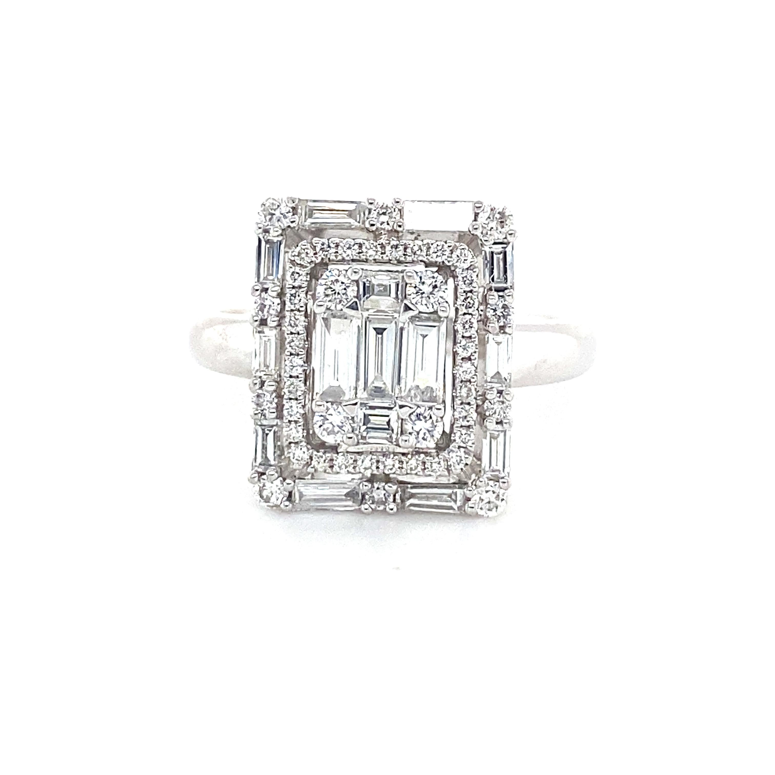 Cette bague exquise présente des diamants incolores d'une qualité irréprochable et des pierres parfaitement taillées qui capturent et reflètent magnifiquement la lumière, créant un éclat éblouissant. Son design unique met en valeur une taille de
