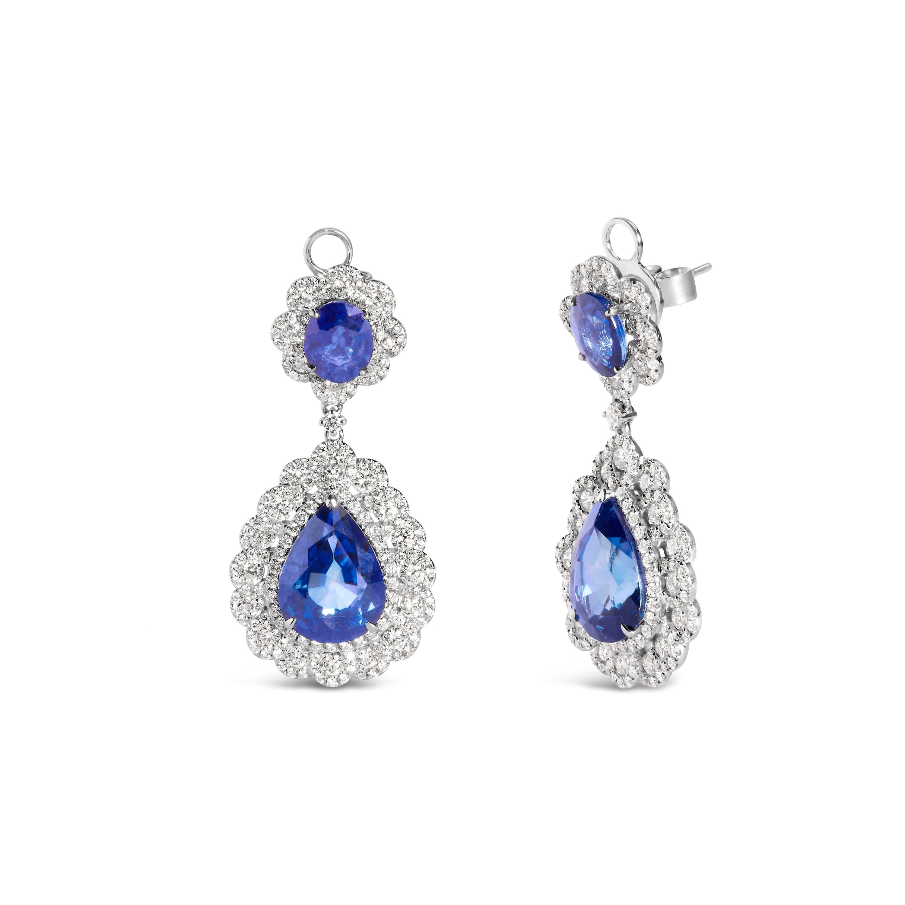 Unveil the epitome of elegance and breathtaking luxury with these exquisite drop earrings, each a symphony of color and light. Crafted from the finest 18K white gold, they dangle gracefully, a testament to timeless craftsmanship and artistic vision.