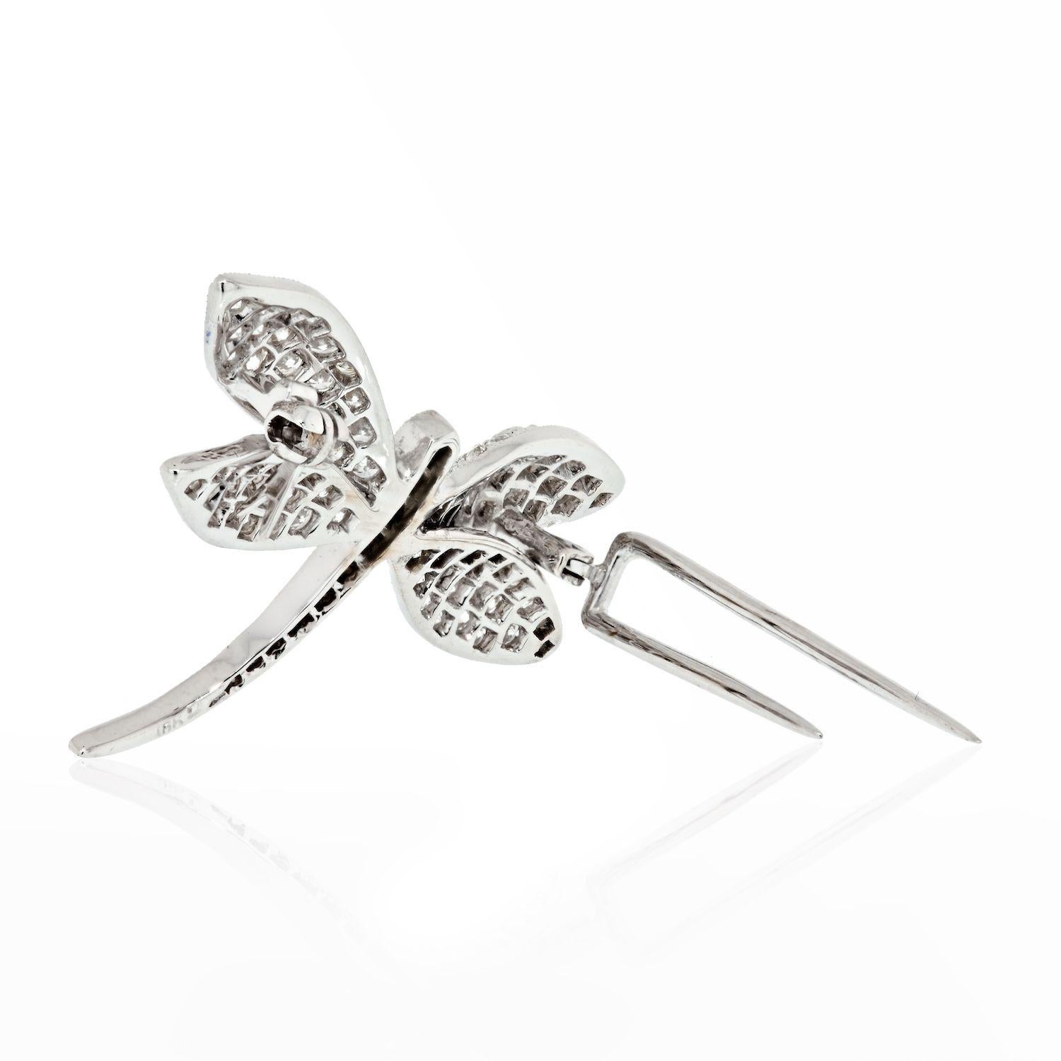 A lovely vintage diamond 18K White Gold 2.50cts Dragonfly Brooch. If you are fond of little creatures we are sure you will fall in love with this diamond brooch fashioned as a dragonfly. 
She is encrusted with round cut diamonds all over her body