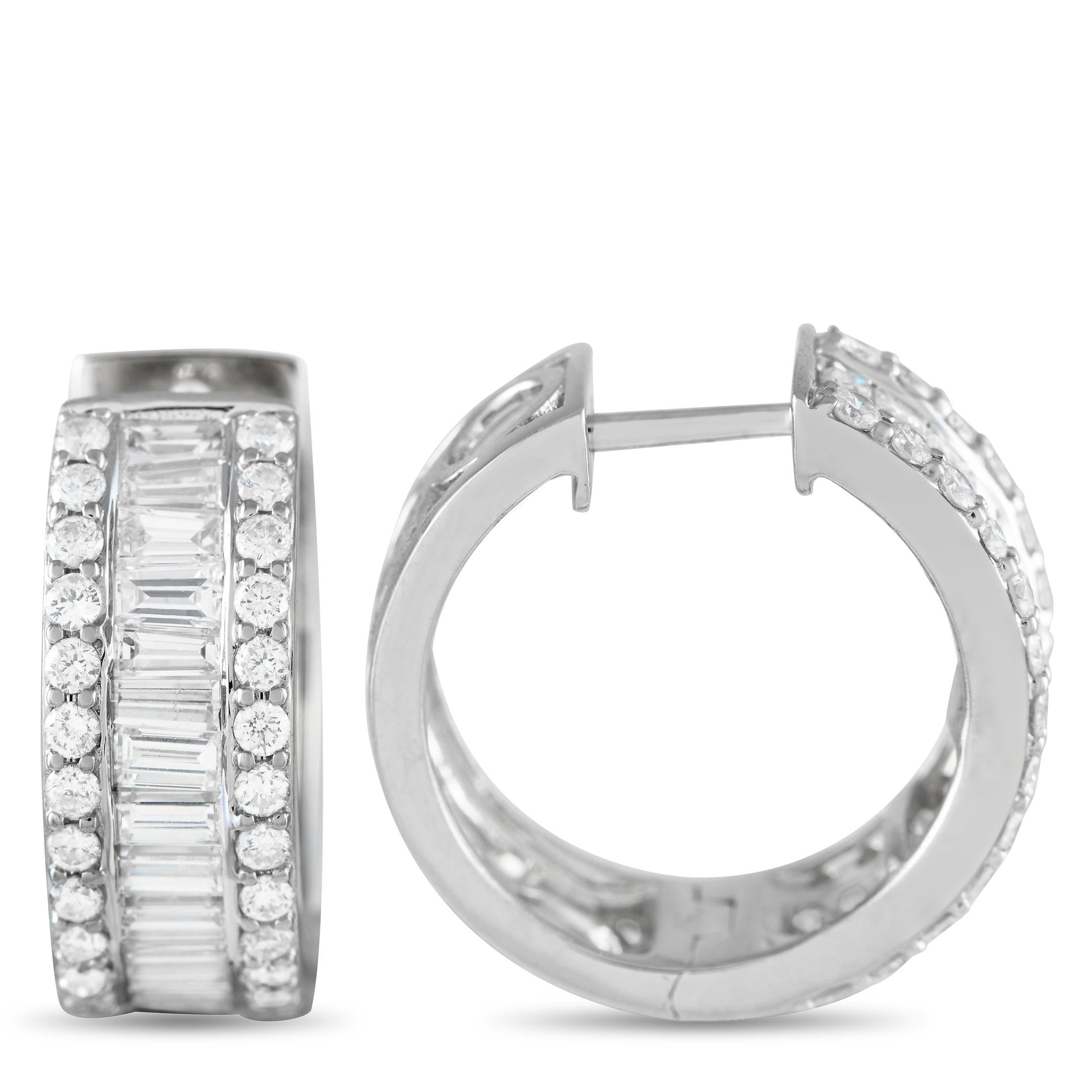 Pull off a luxe look in no time with these diamond hoops. They come decorated with three rows of diamonds. In the middle is a row of baguette diamonds in a channel setting. The edges are traced with a row of round diamonds.This brand new pair of 18K