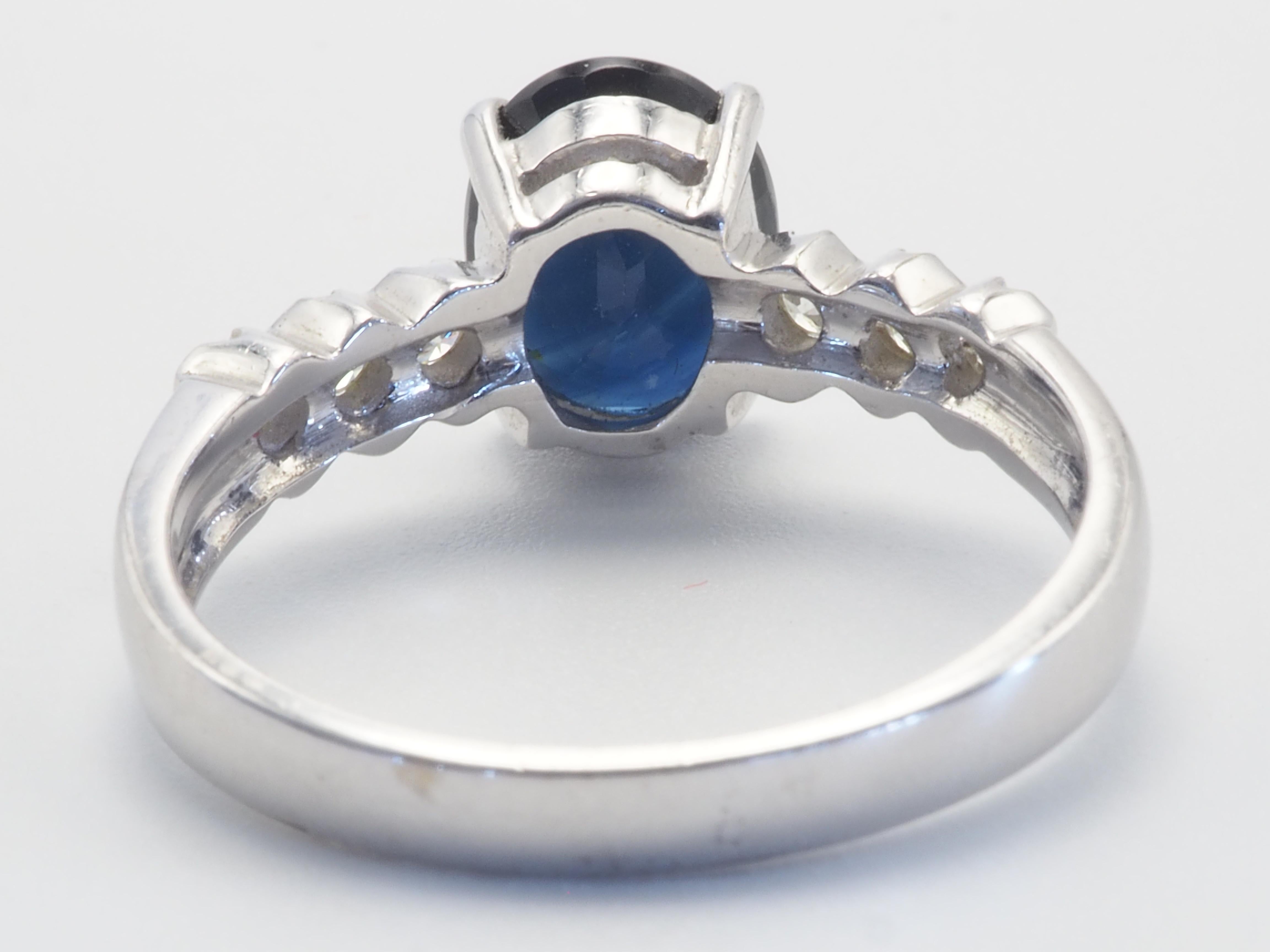 Oval Cut 18K White Gold 2.57ct Inky Blue Sapphire & 0.21ct Diamond Fine Engagement Ring For Sale