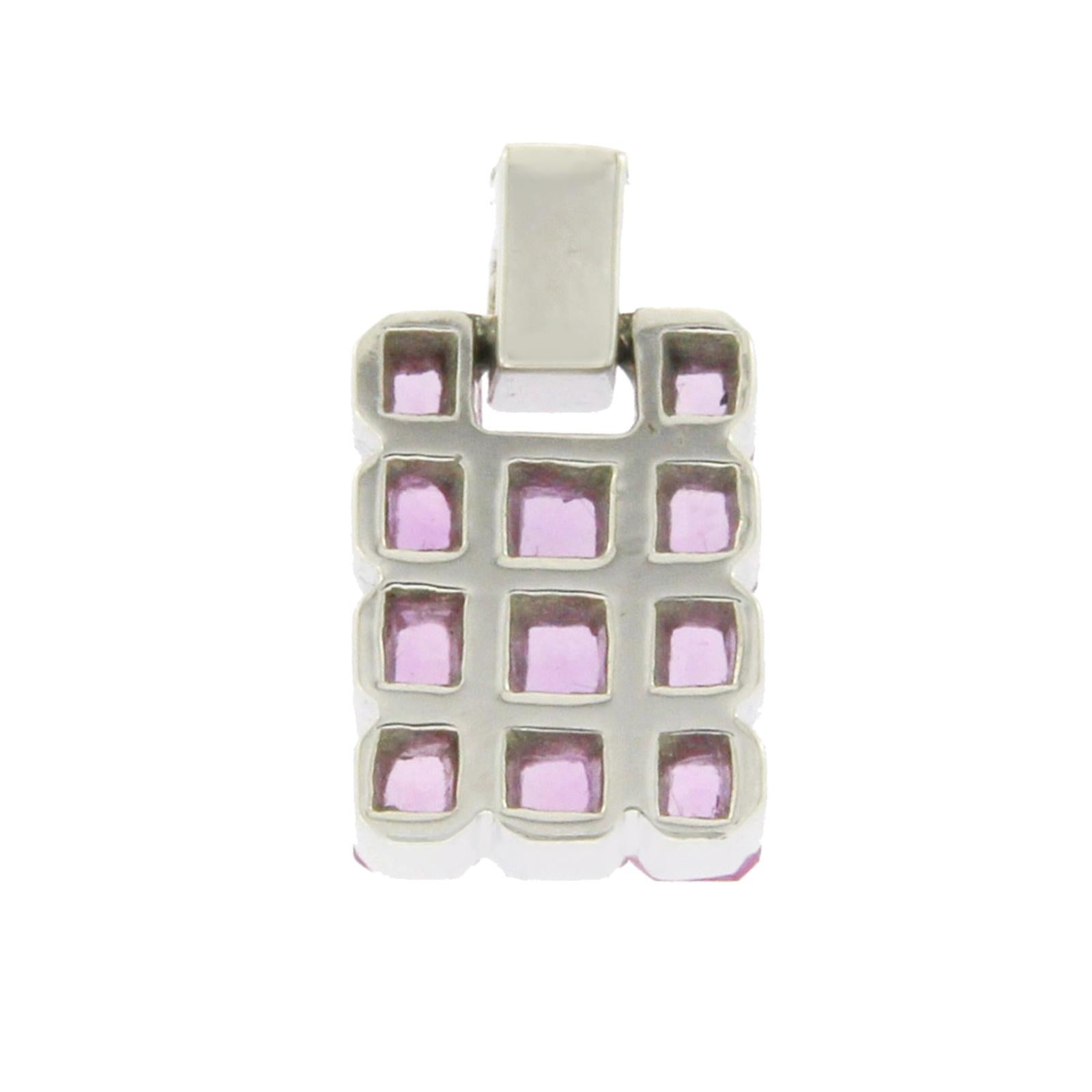 Type: Pendant
Height: 14.5 mm
Width:9 mm
Metal: White Gold
Metal Purity: 18K
Stone Type:0.25 CT G VS2 Diamonds 3.95 CT Natural Pink Sapphire
Hallmark:750
Total Weight: 4.1 Grams
Condition: New
Stock Number: BL116