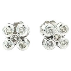 Boucles d'oreilles fleur en or blanc 18k avec chaton et diamant rond de 0,25ctw