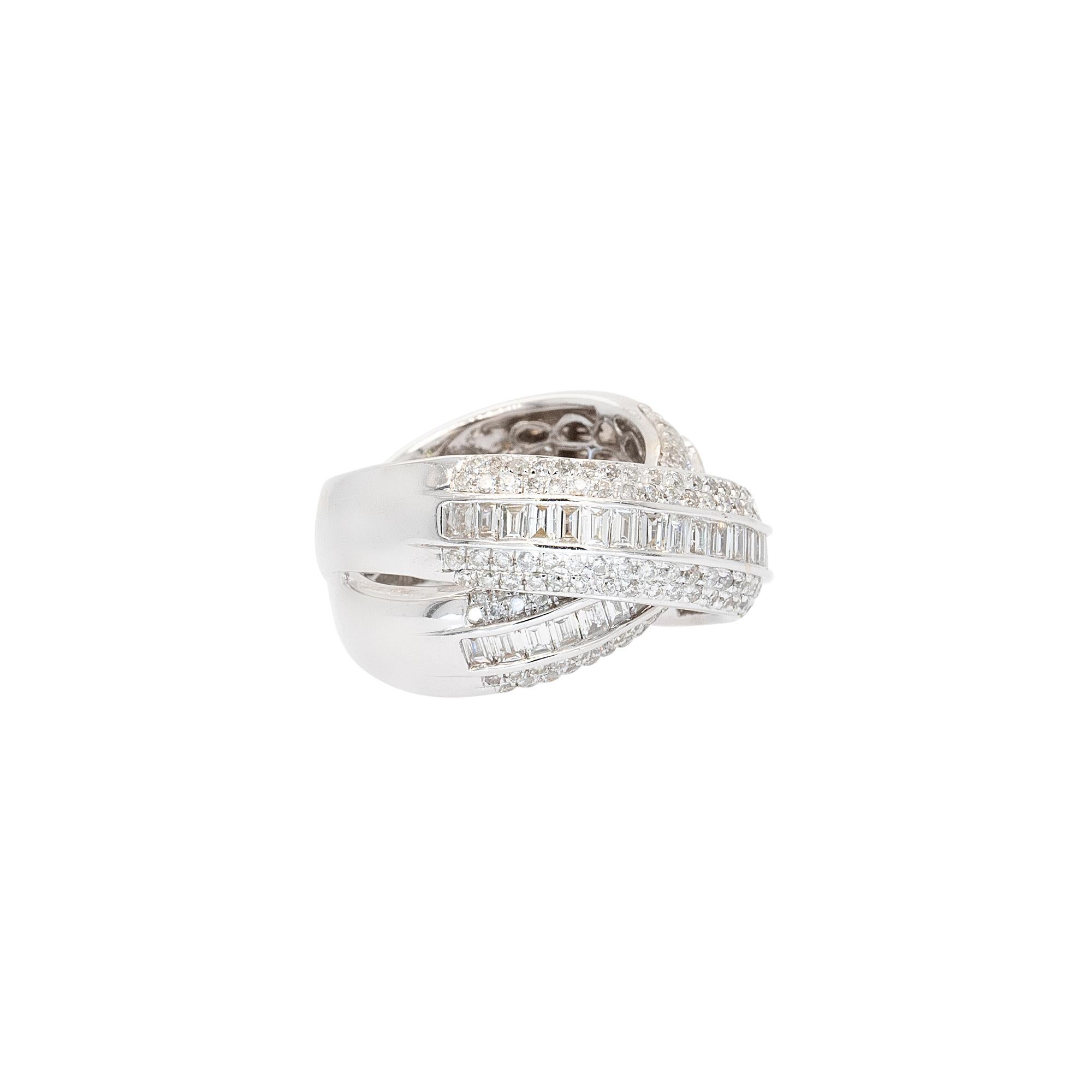 Diamond Details: 
Approx 2.60ctw Round Brilliant and Baguette Natural Diamond 
G/H Color SI Clarity
Ring Material: 18k White Gold
Ring Size: 7.5 (can be sized)
Total Weight: 12.44g (7.99dwt)
This item comes with a presentation box!
SKU: