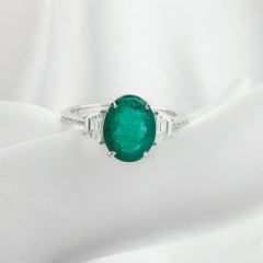 18K White Gold 2.62-Carat Oval Emerald and Diamond Three-Stone Ring