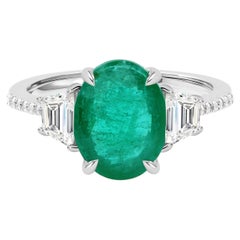 18K White Gold 2.62-Carat Oval Emerald and Diamond Three-Stone Ring