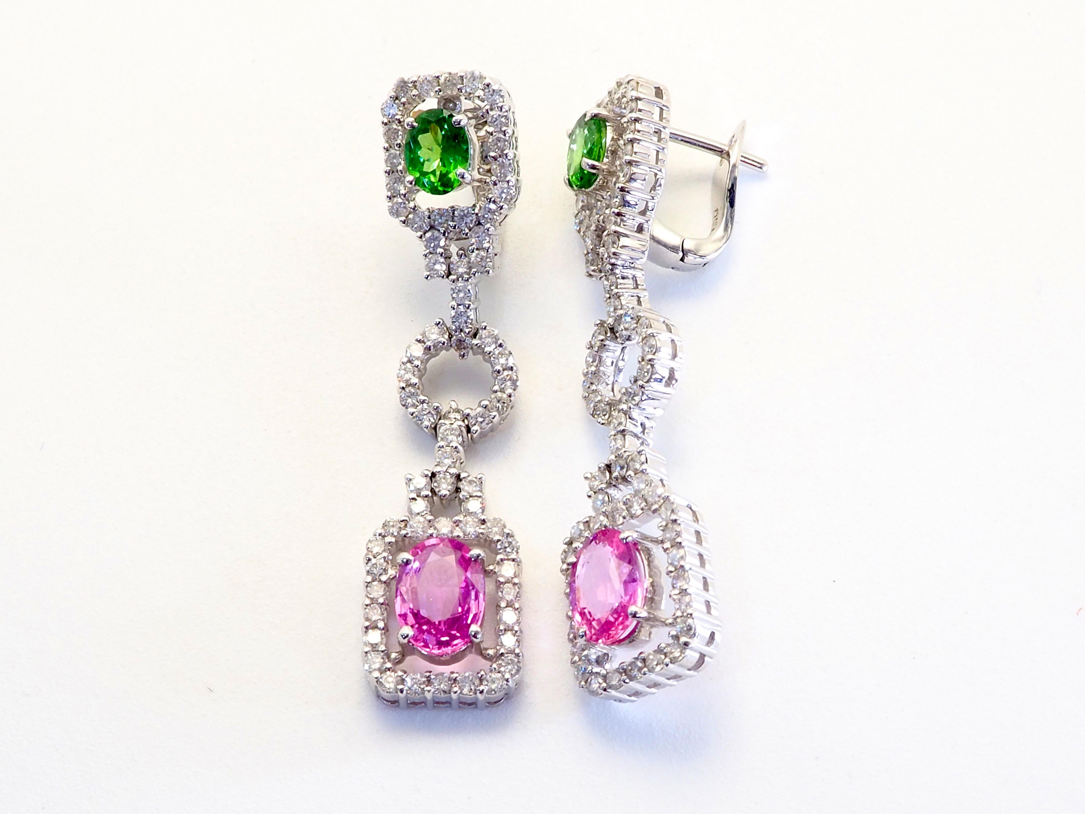 Meticulous work from a renowned designer and craftsman from Hong Kong. The joints are movables. The star here are the pairs of bright oval pink sapphires and bright green tsavorite garnets.  It is a work of art that is worth keeping