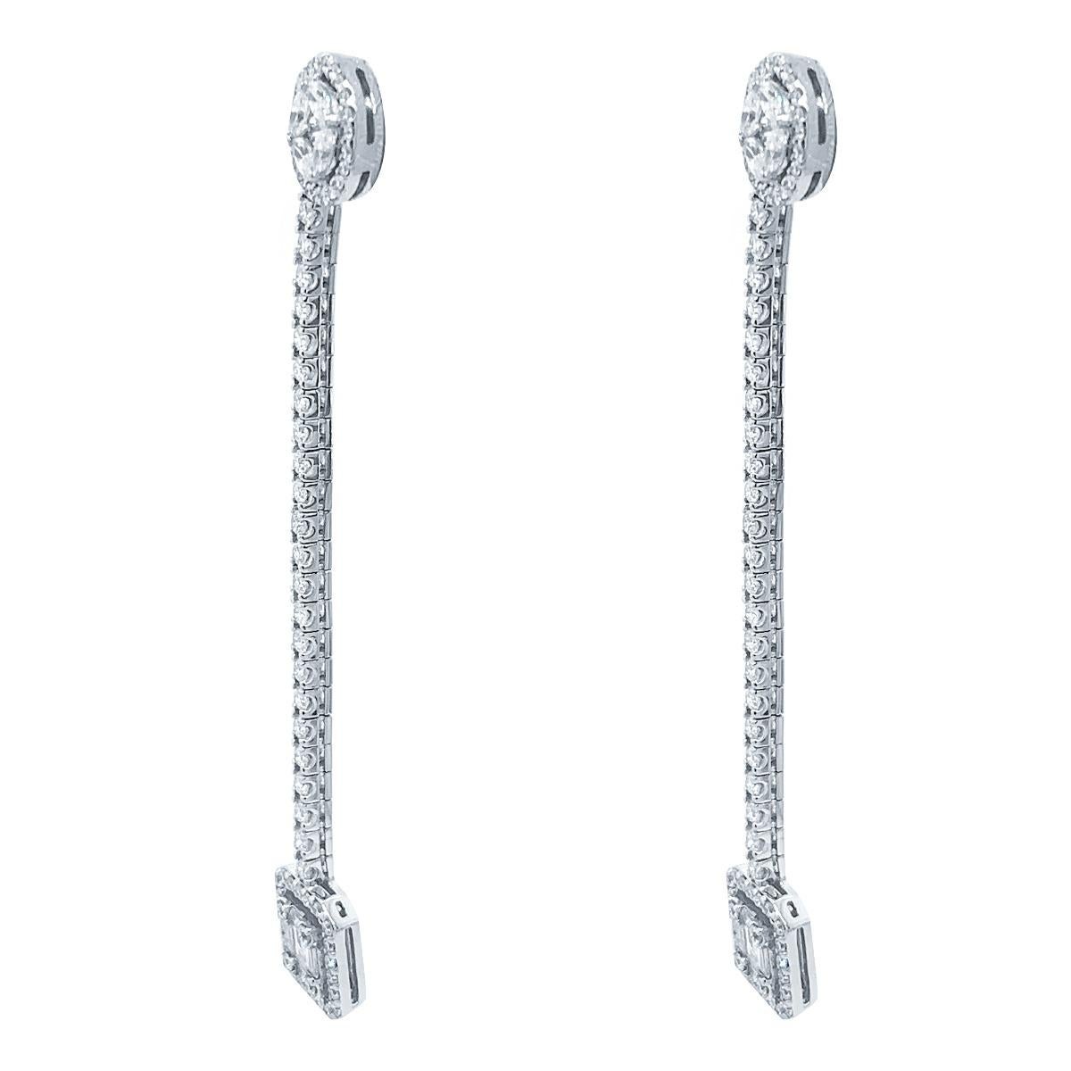 Diamond Emerald Cluster Earrings in 18K White Gold
Item Details

• Total Diamond Weight:  2.72 Ctw.
• Diamond Color Clarity: G Color VS1 Clarity
• Diamond Shape: Baguettes & Rounds
• Setting Type: Invisible & Micro Pave

• Gold Kt: 18K White Gold.
•