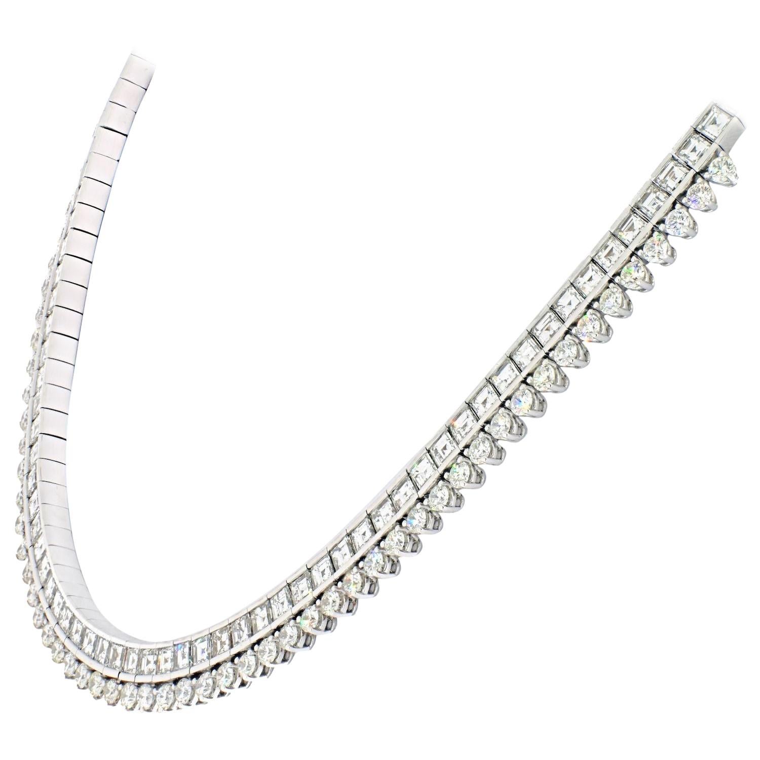 This is a stunning 18K White Gold Necklace, that is slick and simple yet carries ample amount of fire and  is looking very posh. Mounted with carre, staright cut square emeralds and rounds these shapes complement each other in a lovely straight line