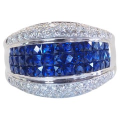 Bague en or blanc 18K avec saphir bleu de 2,90 ct et diamant de 0,60 ct en serti clos