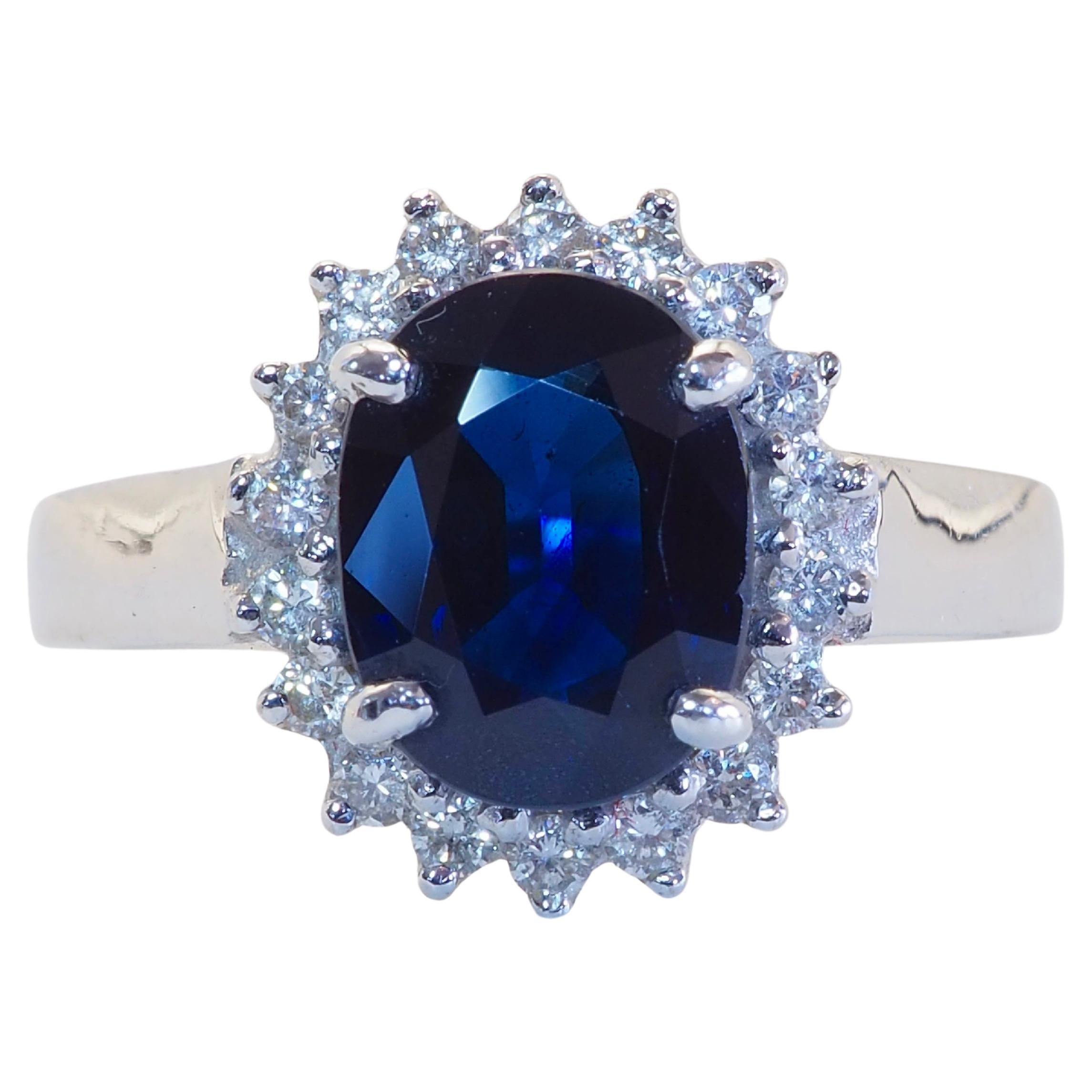 Anello a raggiera in oro bianco 18 carati con zaffiro blu verdastro e diamante da 0,24 carati